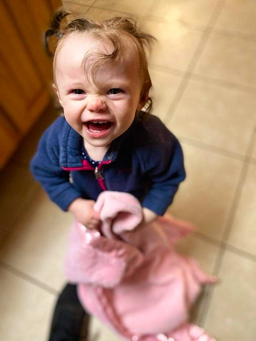Paisley Makenna is registered to the contest to win money with this photo: arm, baby_toddler_clothing, cheek, dress, eye, face, floor, hair, happy, head, human_body, iris, mouth, nose, person, pink, skin, sleeve, smile, toddler