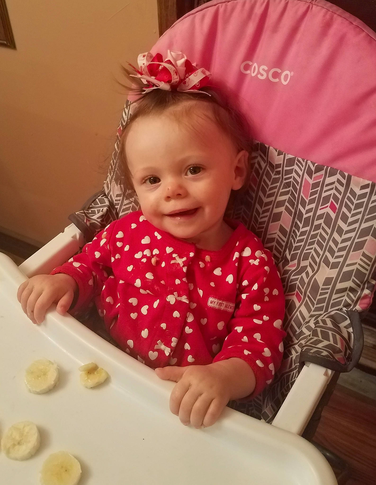 Paisley Makenna is registered to the contest to win money with this photo: arm, baby, baby_toddler_clothing, beauty, chair, child, cuisine, dress, finger, food, happy, hat, human_body, joy, person, pink, product, skin, sleeve, smile