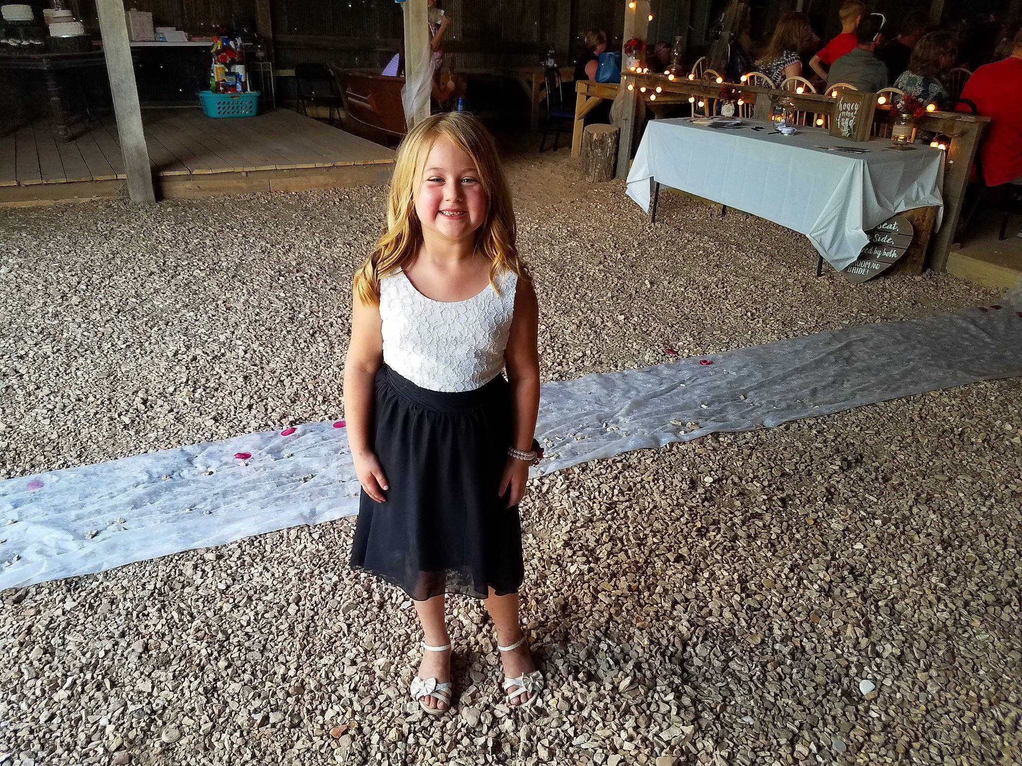 Adrian is registered to the contest to win money with this photo: asphalt, chair, child, dress, event, floor, flooring, fun, grass, happy, joy, leg, leisure, person, plant, road_surface, smile, street_fashion, sunglasses, toddler