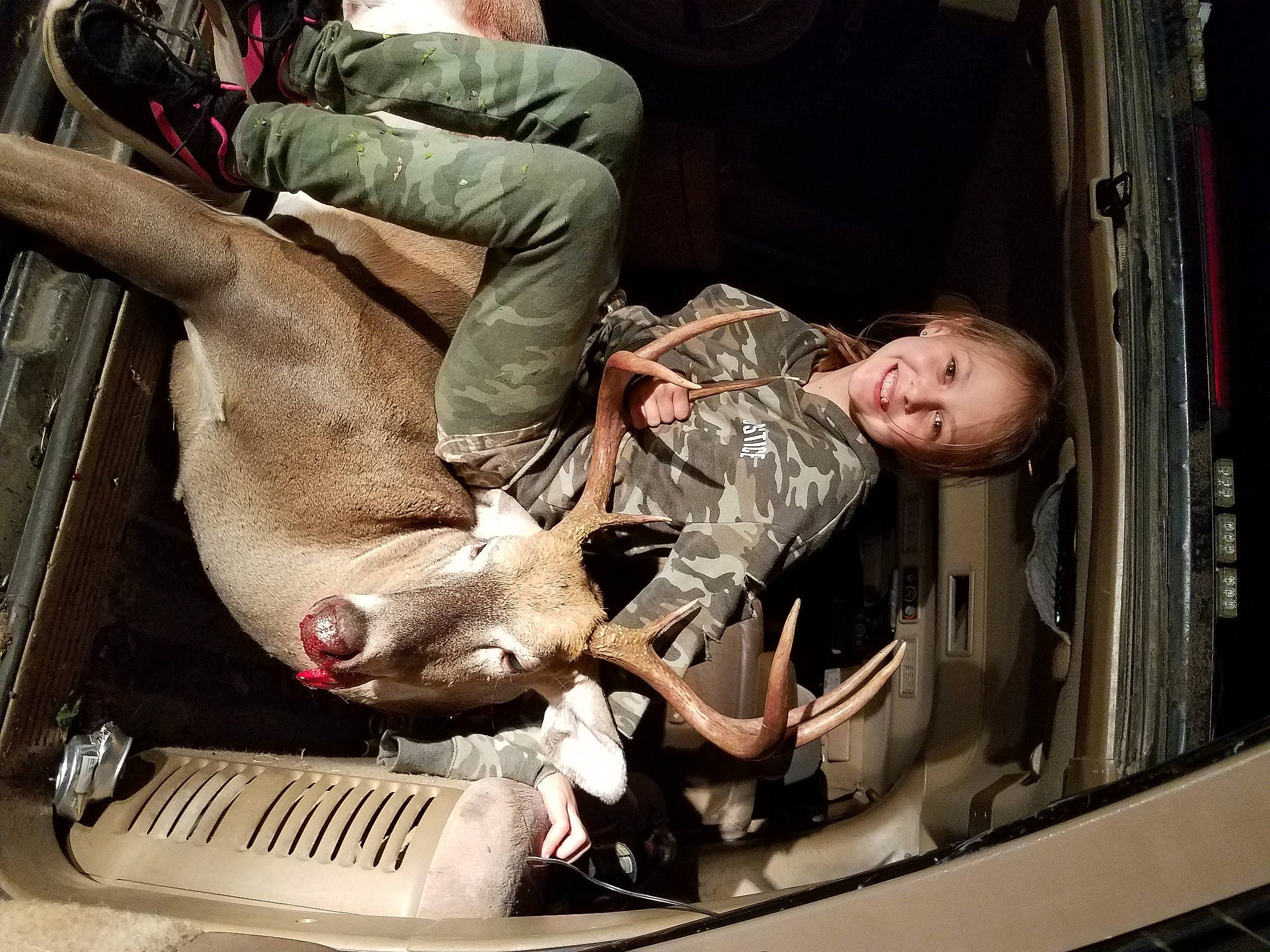 Carmen is registered to the contest to win money with this photo: auto_part, automotive_design, automotive_exterior, automotive_lighting, flesh, fun, human_leg, joy, leg, machine, metal, motor_vehicle, person, room, transport, vehicle_door