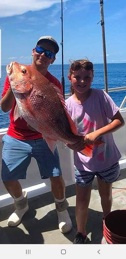 Kailey joined the competition — help win amazing prizes! active_shorts, bermuda_shorts, big_game_fishing, boat, fish, fisherman, fishing, fishing_rod, hat, headwear, jigging, joy, muscle, person, ray_finned_fish, recreation, recreational_fishing, shorts, sky, smile