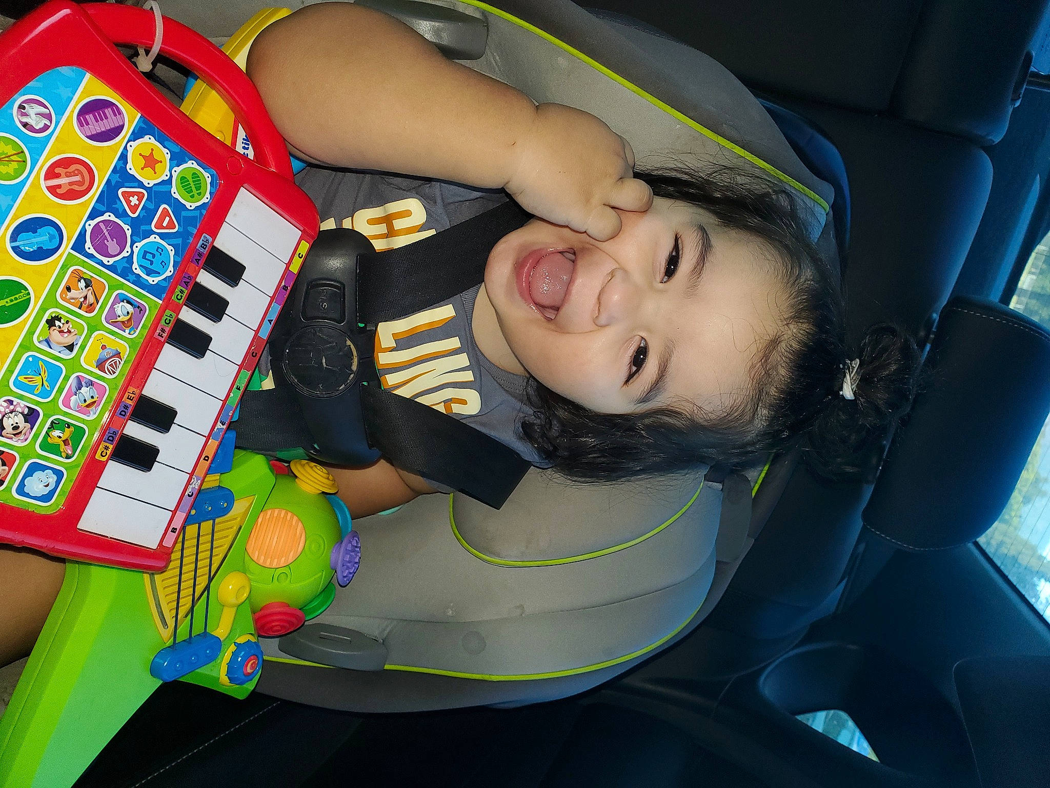 Anthony joined the competition — help win amazing prizes! audio_equipment, auto_part, car_seat, car_seat_cover, child, comfort, electronic_instrument, folk_instrument, free_reed_aerophone, fun, input_device, keyboard, musical_instrument, musical_keyboard, office_equipment, person, piano, smile, toddler, toy