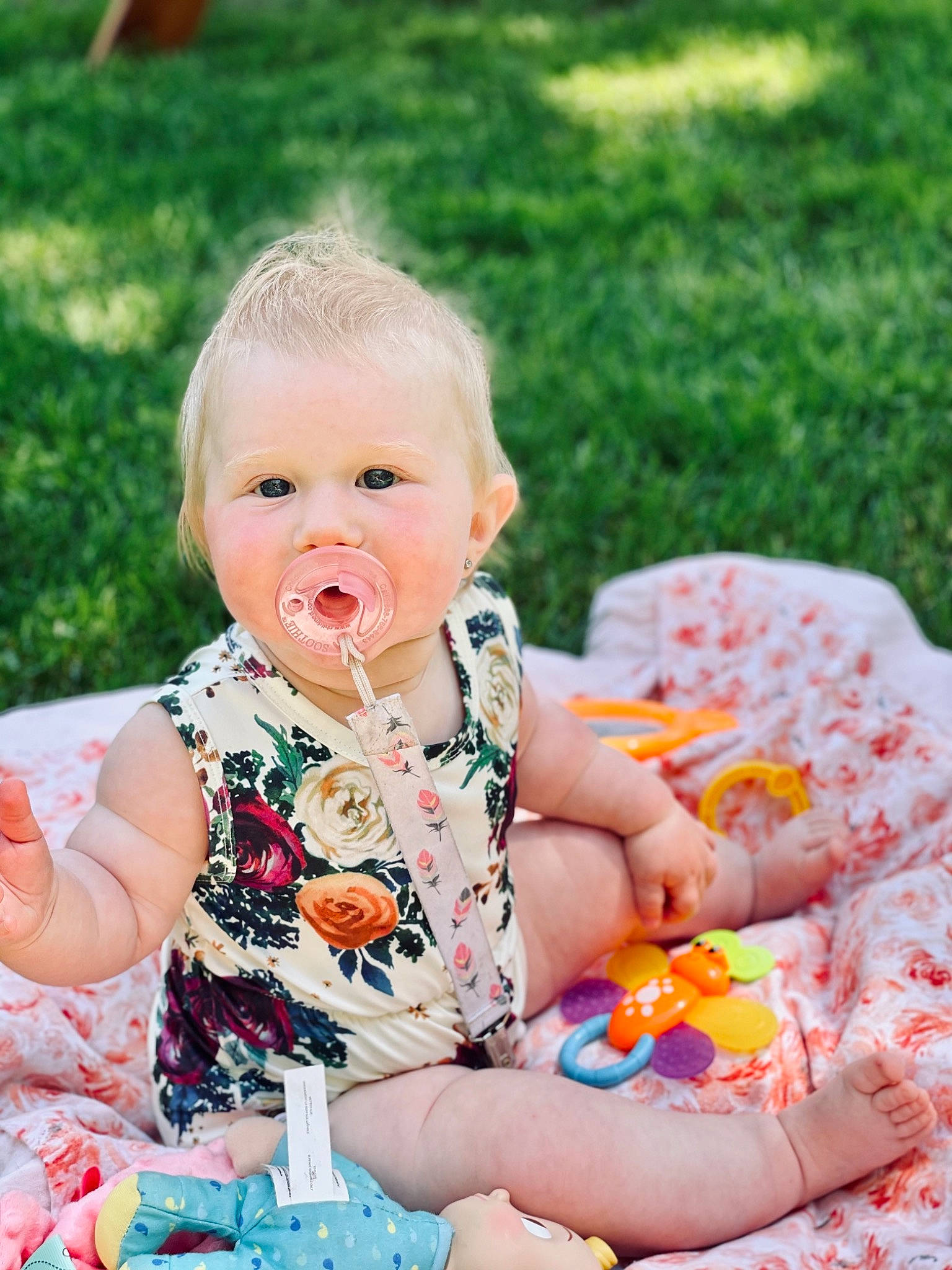 Tinsley is registered to the contest to win money with this photo: baby, baby_toddler_clothing, cheek, child, dress, eye, face, facial_expression, finger, hand, happy, head, iris, orange, people, person, pink, product, skin, toddler