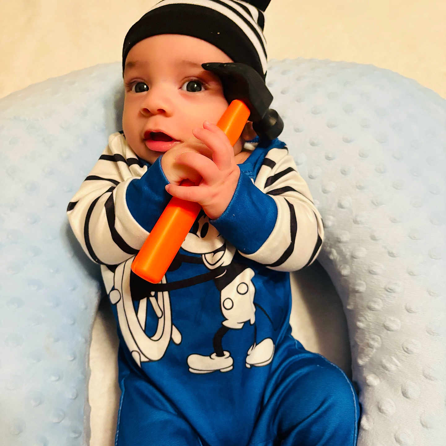 Ryan Marcial is registered to the contest to win money with this photo: baby, baseballcap, bodypart, cap, clothing, couch, device, face, finger, furniture, hammer, hand, happy, hat, head, person, photography, portrait, smile, tool