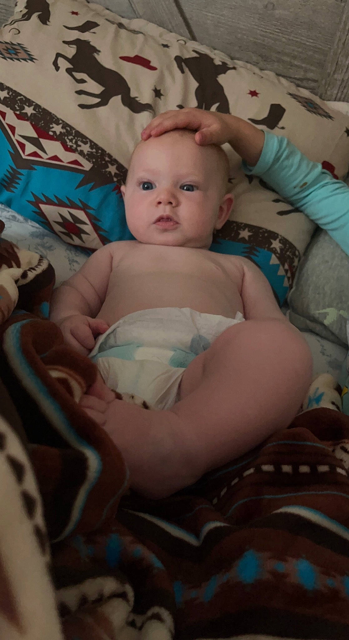 Kooper is registered to the contest to win money with this photo: abdomen, arm, baby, baby_toddler_clothing, chair, cheek, chest, comfort, eye, eyelash, hand, head, headgear, iris, mouth, neck, person, skin, textile, toddler