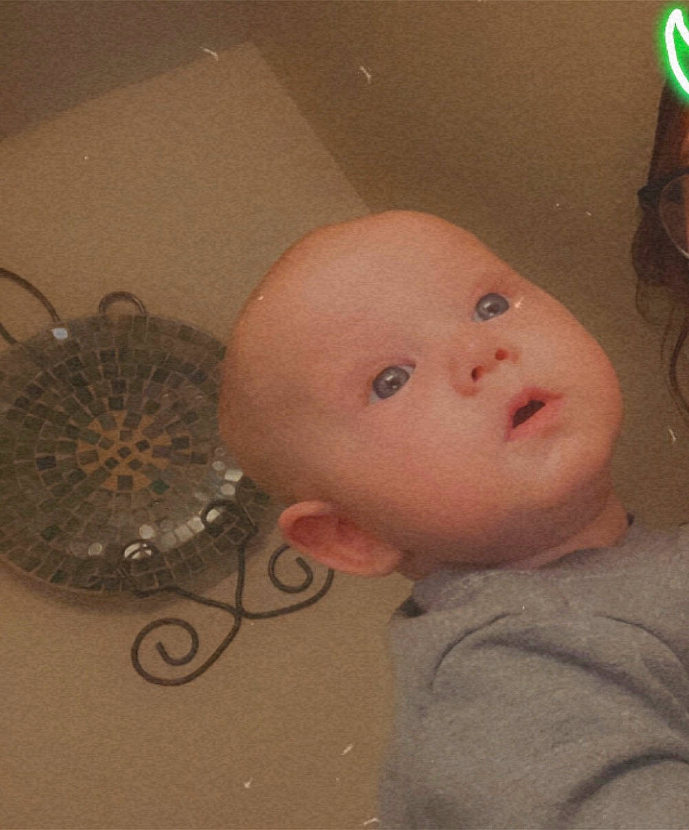 Kooper is registered to the contest to win money with this photo: art, baby, baby_toys, cheek, child, circle, doll, eyebrow, eyelash, forehead, lip, nose, person, room, tin_can, toy