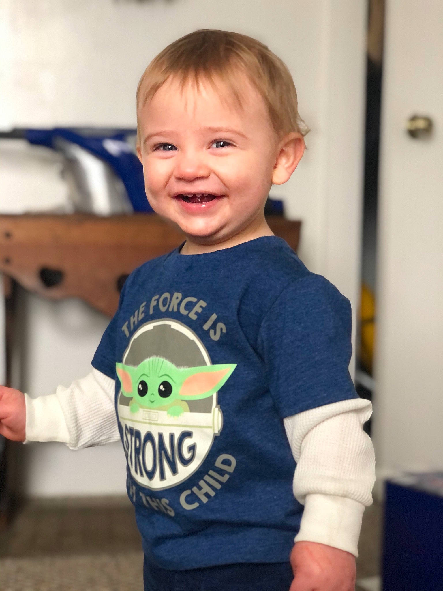 Atticus is registered to the contest to win money with this photo: active_shirt, baby, baby_products, baby_toddler_clothing, cheek, child, cool, finger, hand, humour, joy, laugh, long_sleeved_t_shirt, mouth, person, play, sleeve, toddler, tooth, top
