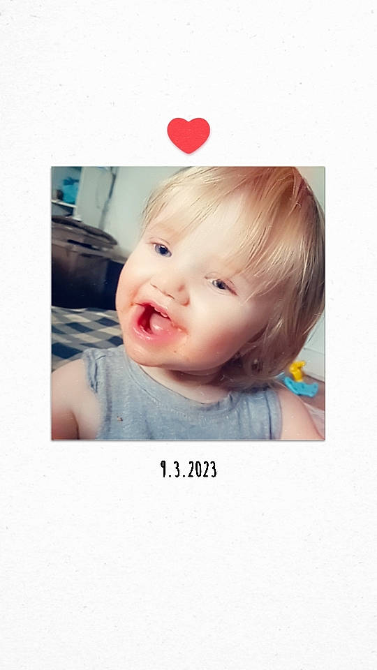 Maggie is registered to the contest to win money with this photo: baby, baby_toddler_clothing, cheek, child, ear, eyelash, fashion_accessory, font, happy, iris, magenta, pattern, person, photo_caption, picture_frame, portrait_photography, product, sleeve, smile, t_shirt