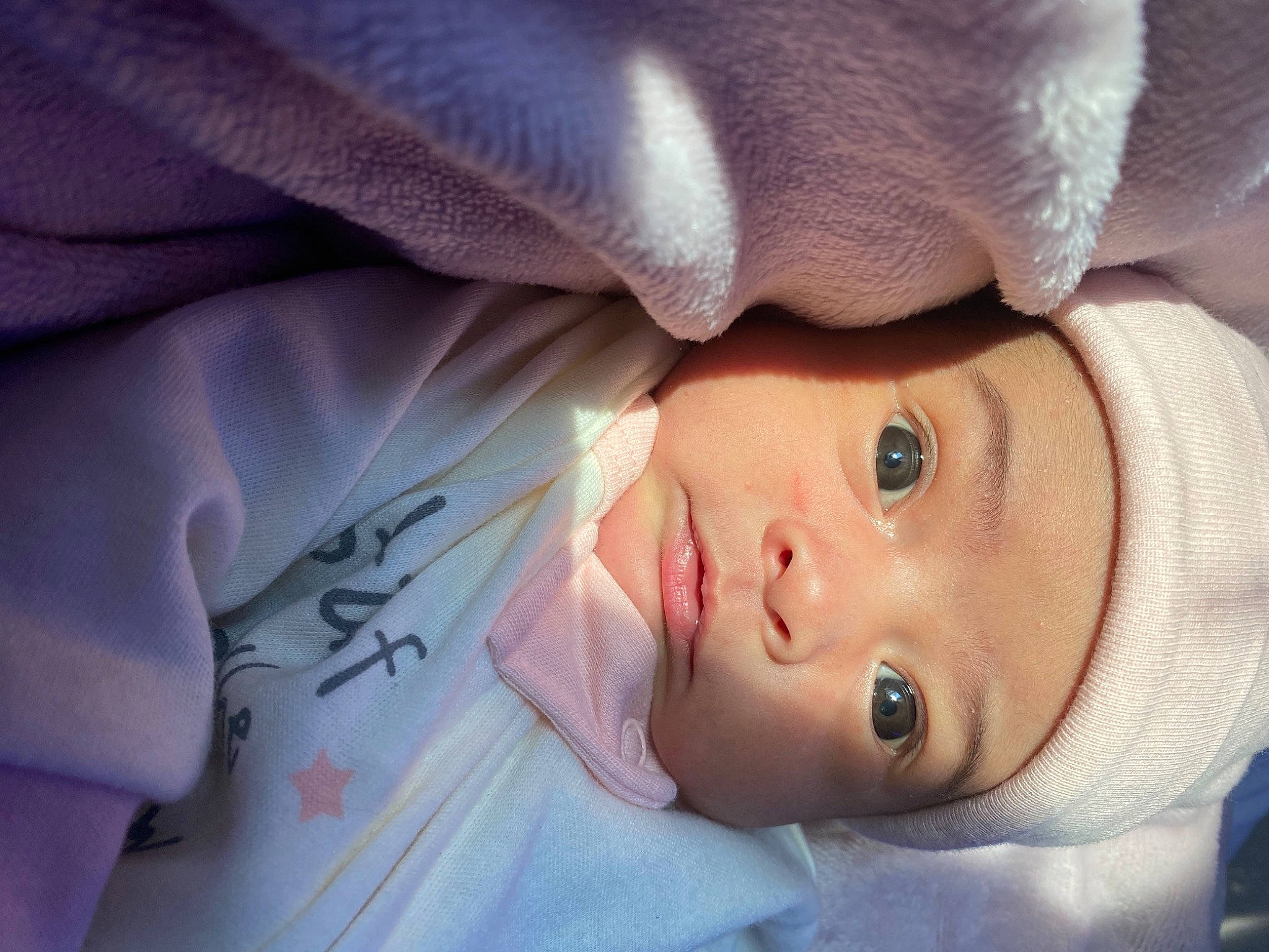 Lilyana joined the competition — help win amazing prizes! baby, baby_toddler_clothing, cheek, close_up, comfort, eyelash, fur, hat, headwear, iris, linens, lip, nose, outerwear, person, skin, sleeve, smile, textile, toddler