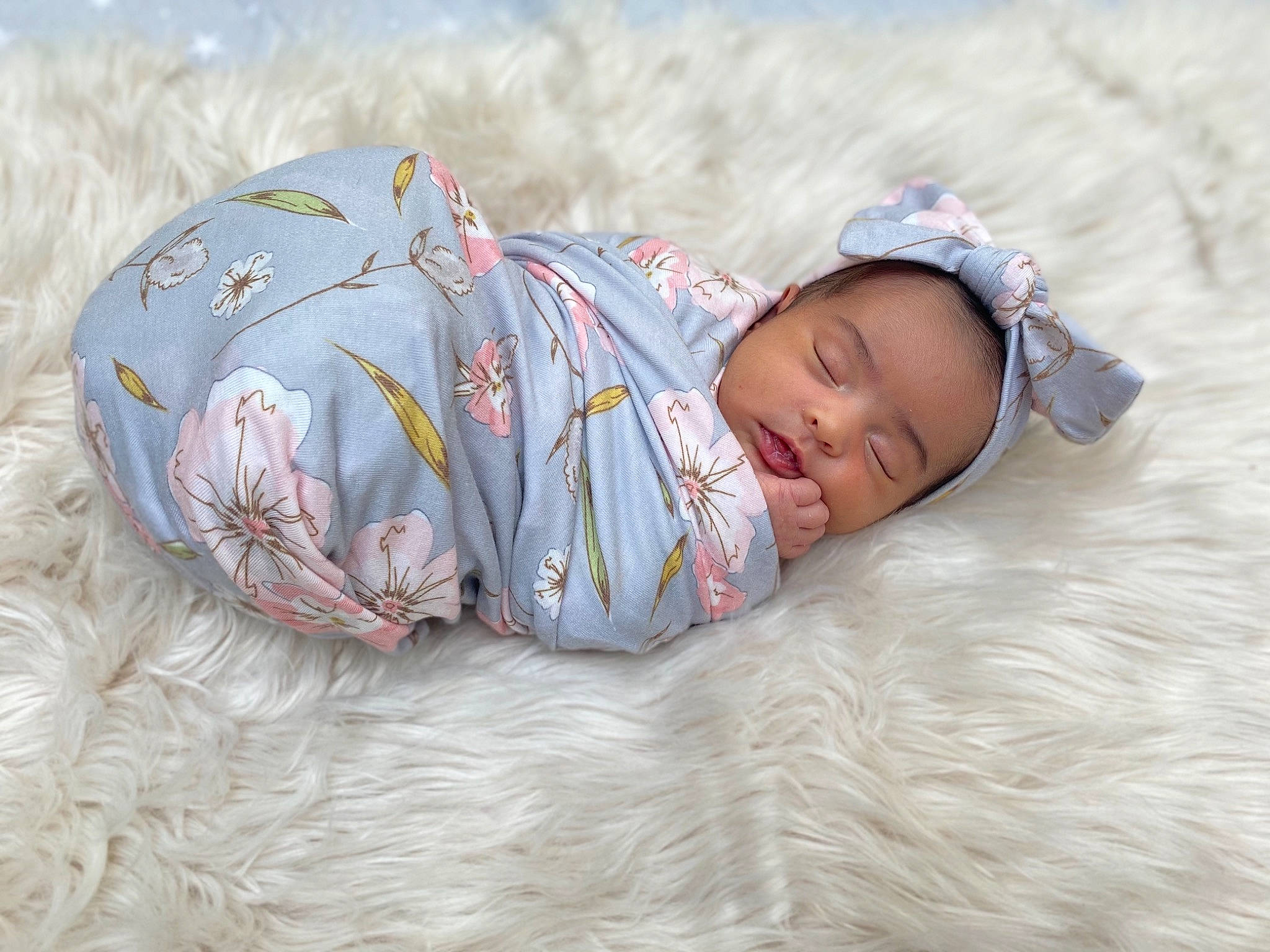 Lilyana is registered to the contest to win money with this photo: baby, baby_toddler_clothing, child, comfort, fur, grass, happy, head, headgear, linens, mammal, nap, pattern, person, sitting, skin, sleep, sleeve, textile, toddler