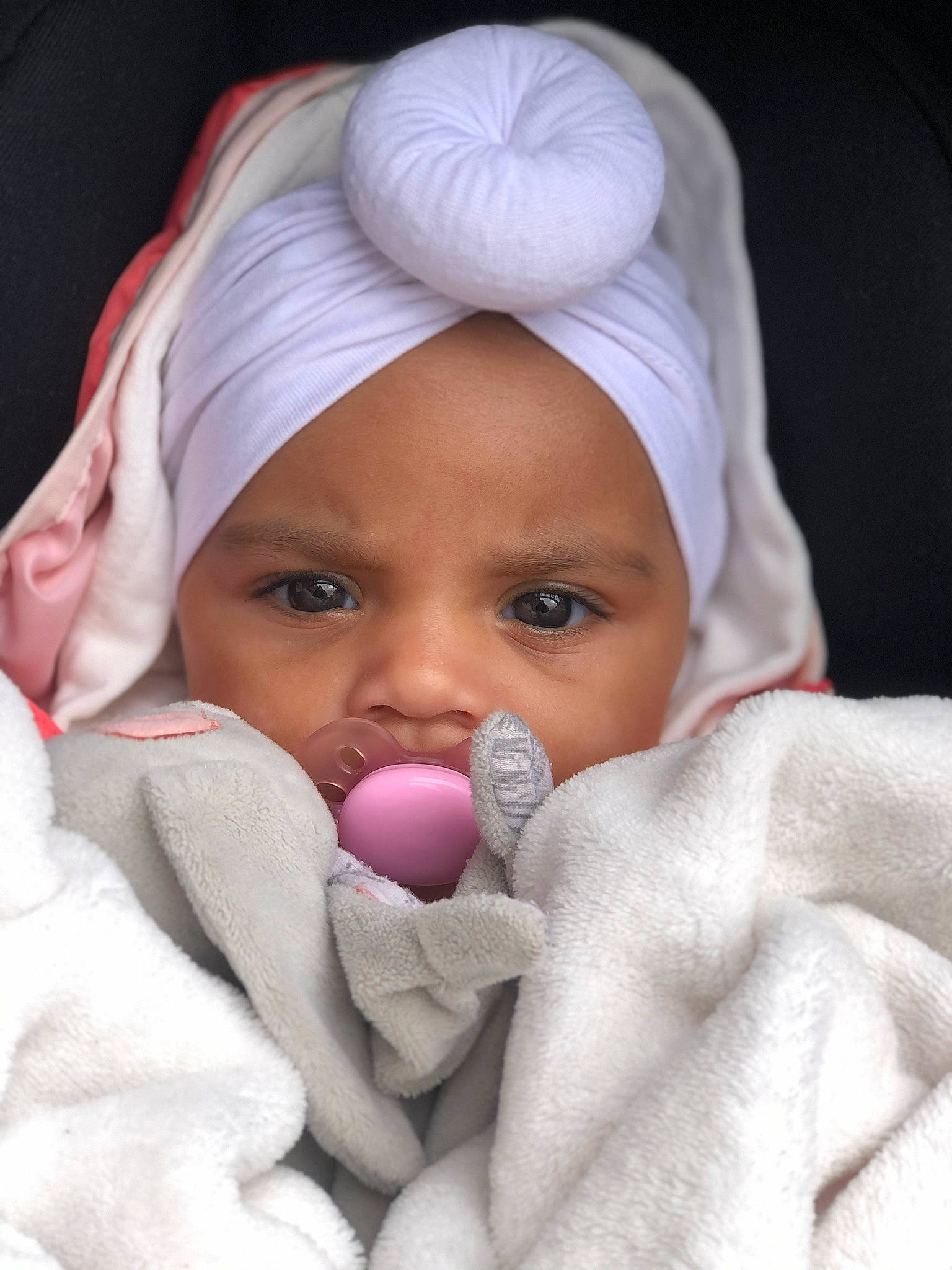 Aiyanah Maria a rejoint le concours — aidez-le/la à gagner de superbes lots ! baby, baby_products, baby_toddler_clothing, blanket, bonnet, cheek, child, comfort, hood, linens, person, photography, skin, toddler, towel