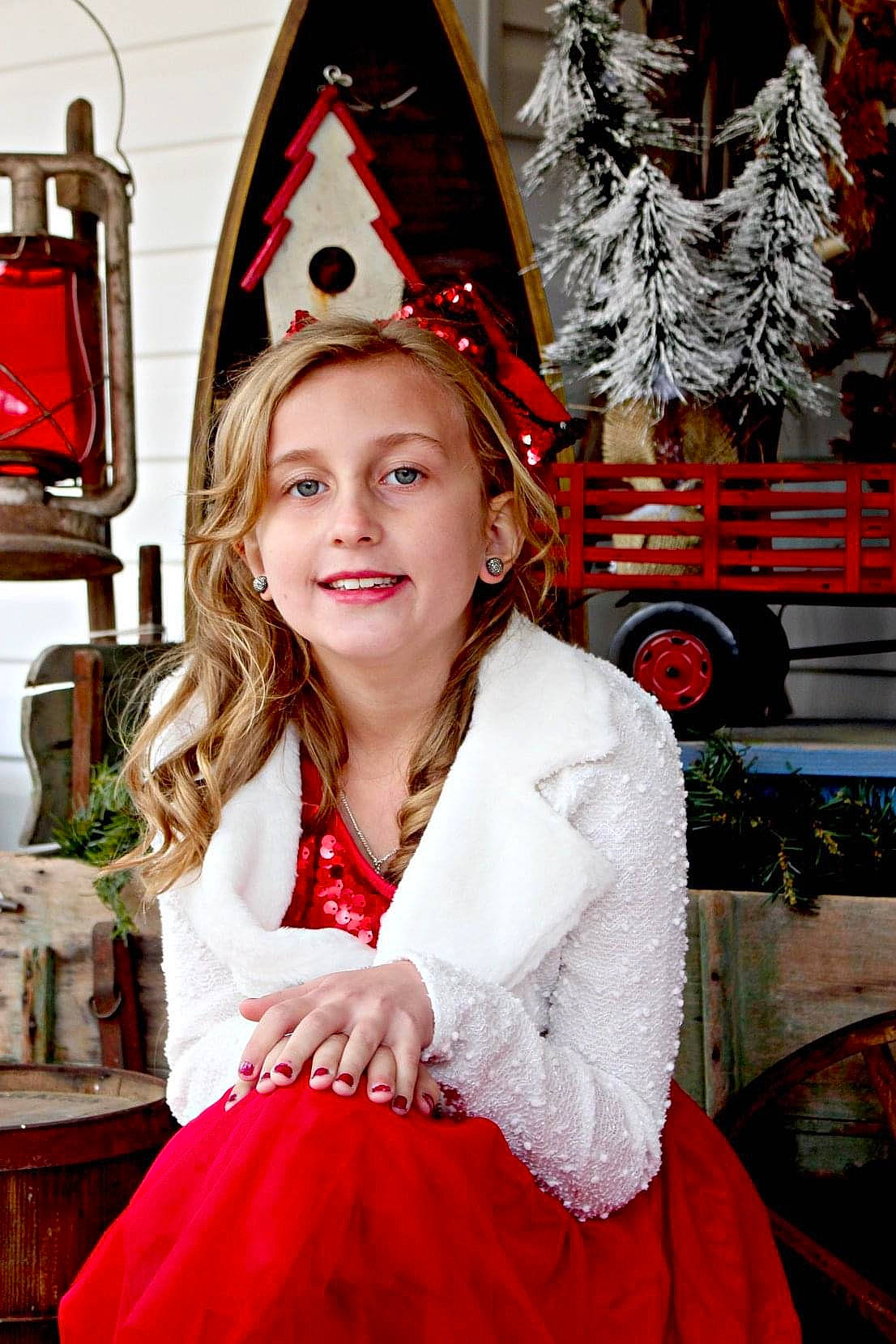 Rilynn is registered to the contest to win money with this photo: conifer, costume_hat, event, eyewear, fashion_accessory, fashion_design, fun, holiday, joy, leisure, magenta, person, plant, red, santa_claus, snapshot, street_fashion, tradition, travel, tree