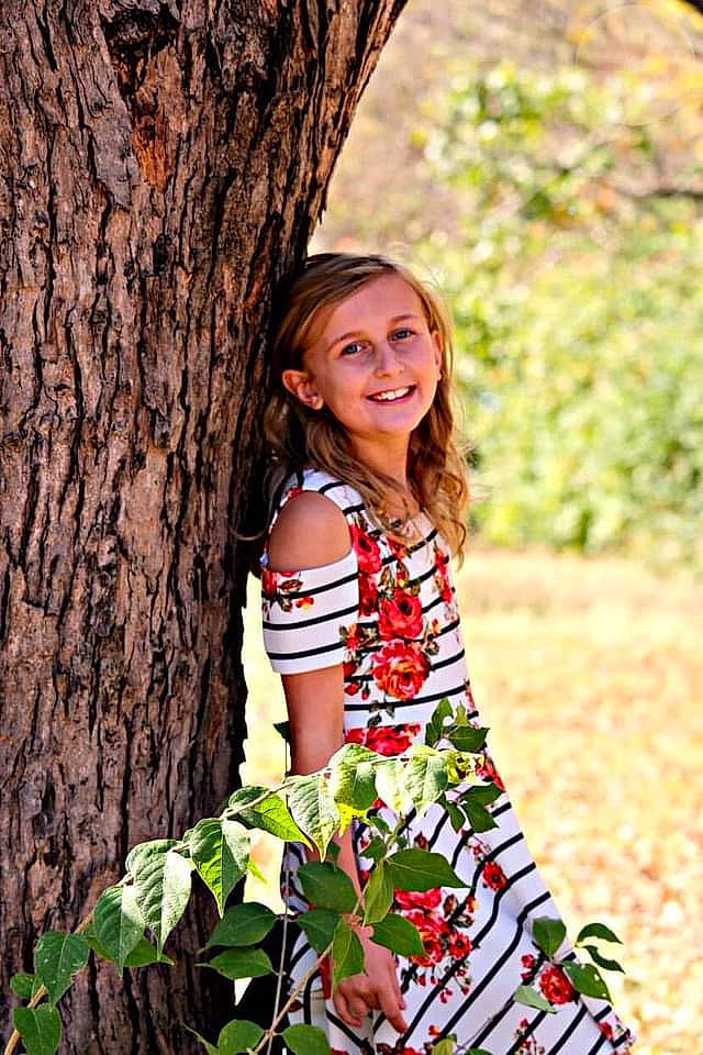 Rilynn joined the competition — help win amazing prizes! botany, branch, facial_expression, flash_photography, grass, happy, joy, leaf, nature, people_in_nature, person, plant, skin, smile, street_fashion, thigh, tree, trunk, waist, wood