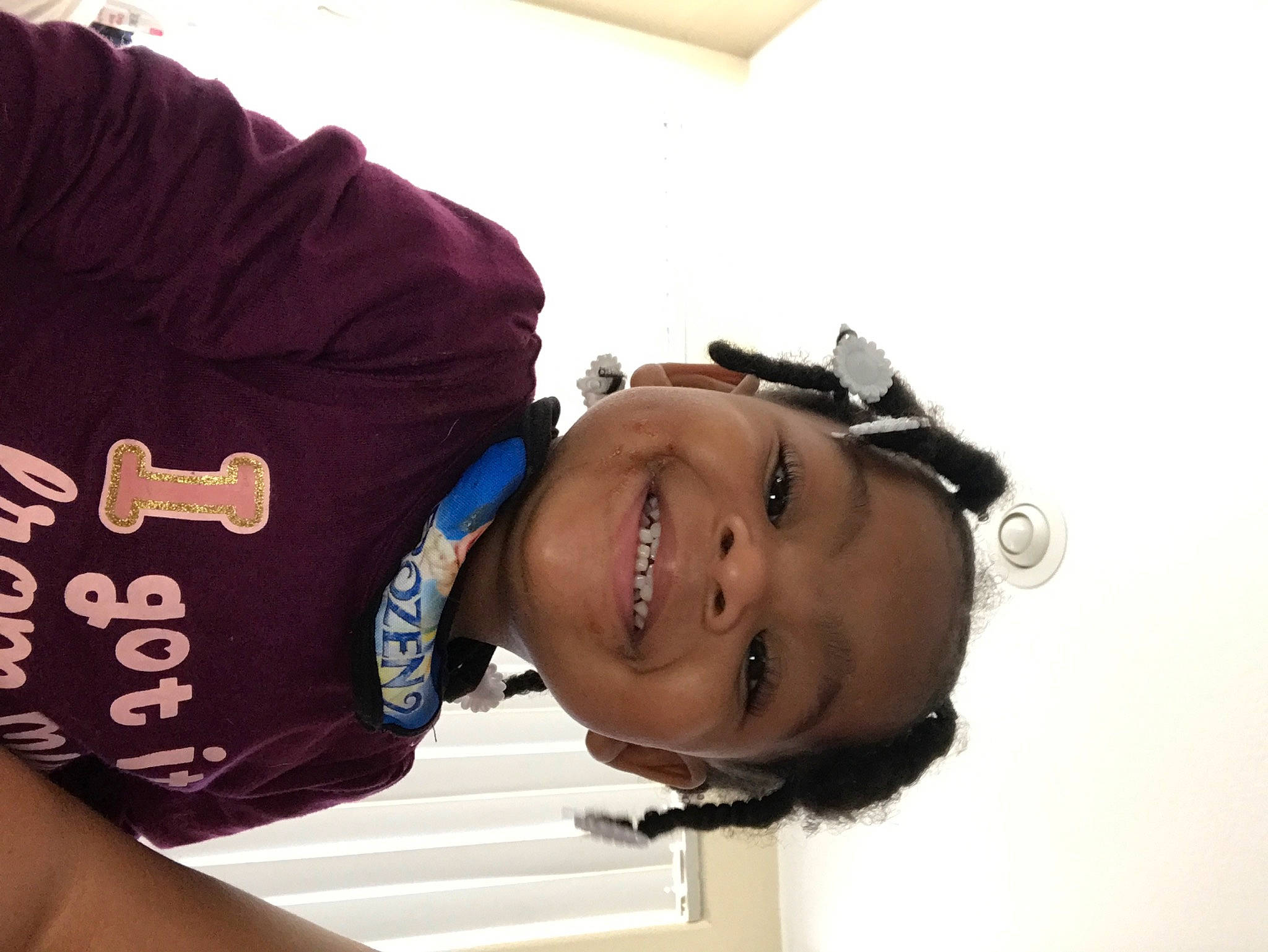 Samira is registered to the contest to win money with this photo: black_hair, child, elbow, electric_blue, eye, eyelash, eyewear, face, fashion_accessory, glasses, happy, hat, joy, lip, neck, nose, person, personal_protective_equipment, sleeve, smile