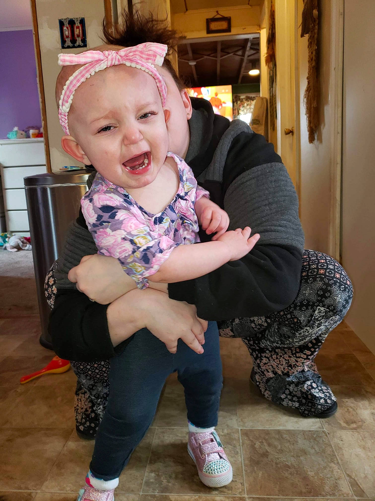 Arraya is registered to the contest to win money with this photo: baby, baby_toddler_clothing, cheek, child, floor, flooring, headwear, leg, person, shoe, sitting, skin, smile, t_shirt, toddler