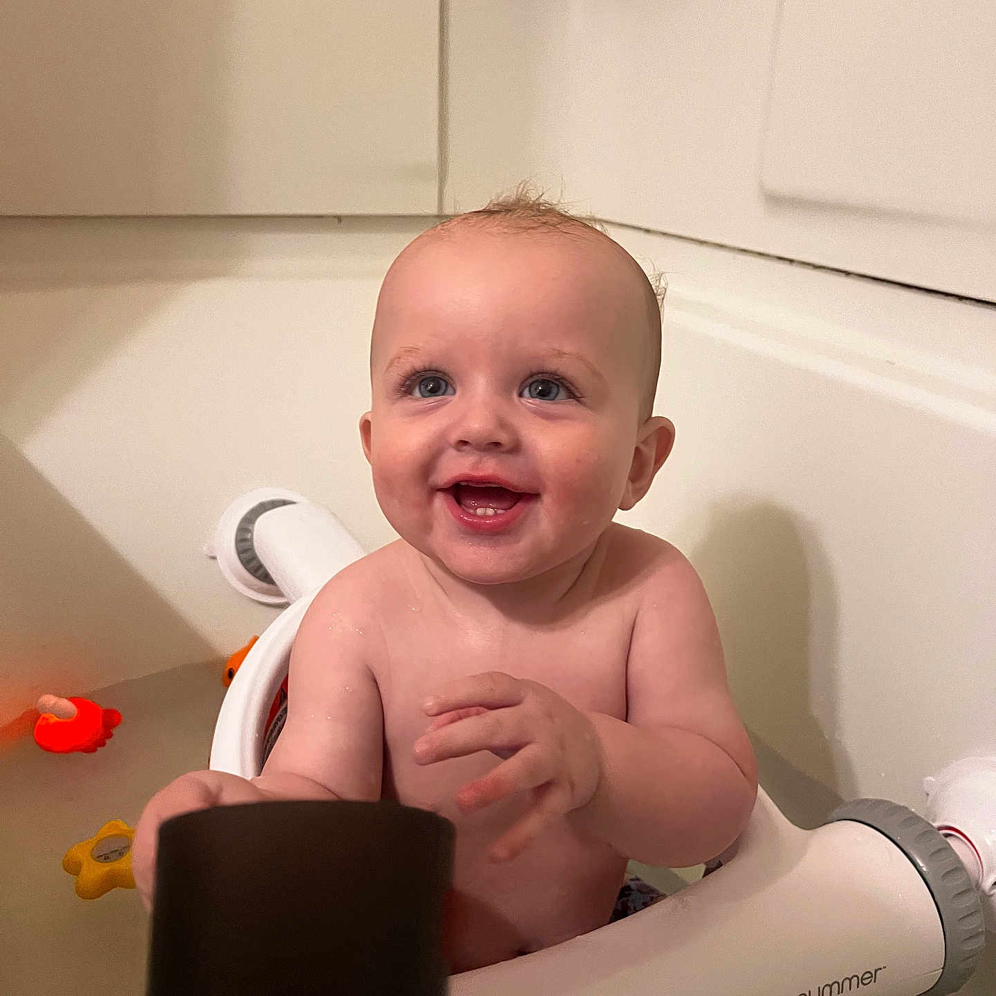 Braxton joined the competition — help win amazing prizes! baby, bath_seat, bath_toys, bathroom, bathtub, blue_eyes, child, cute, happy, indoor, person, plumbing, sitting, skin, smiling, summer, toy, water, white, young_child
