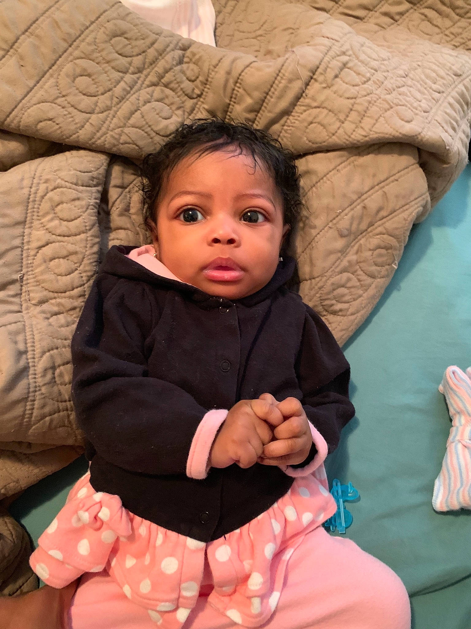 Marnaya is registered to the contest to win money with this photo: child, eye, fun, girl, infant, person, pink, product, sitting, skin, smile, toddler