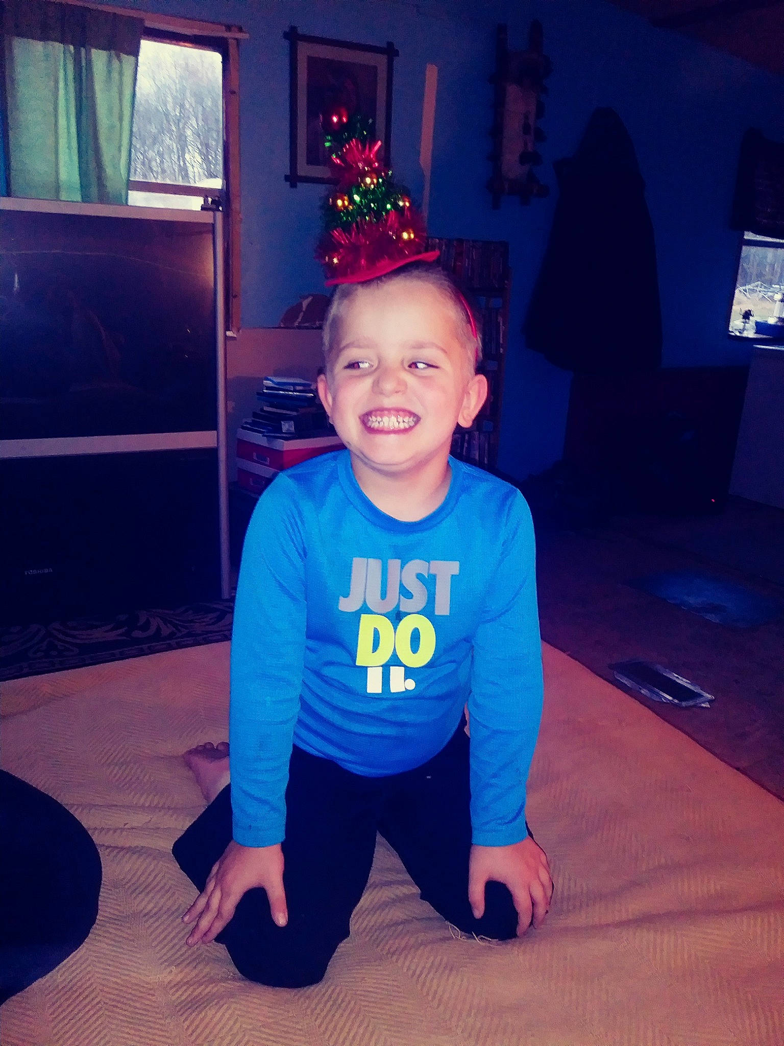 Zander joined the competition — help win amazing prizes! blue, child, electric_blue, eye, face, facial_expression, fun, happy, head, joy, leg, night, person, sitting, sky, smile, snapshot, sportswear, standing, t_shirt