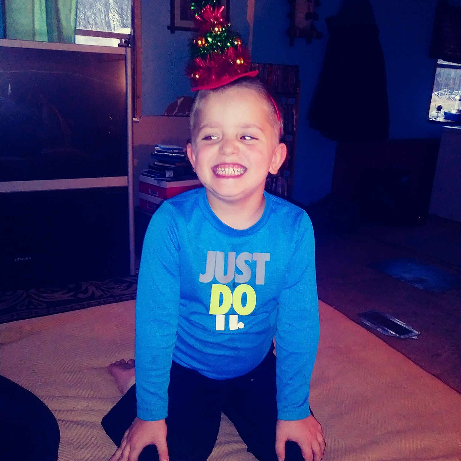 Zander joined the competition — help win amazing prizes! blue, child, electric_blue, eye, face, facial_expression, fun, happy, head, joy, leg, night, person, sitting, sky, smile, snapshot, sportswear, standing, t_shirt