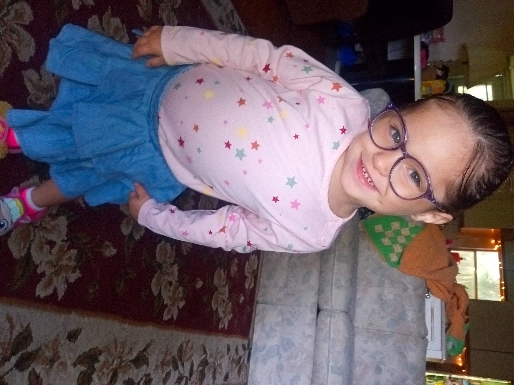 Cypress is registered to the contest to win money with this photo: baby, baby_toddler_clothing, cheek, child, comfort, eyewear, fun, glasses, happy, joy, pattern, person, pink, room, sleeve, smile, textile, toddler