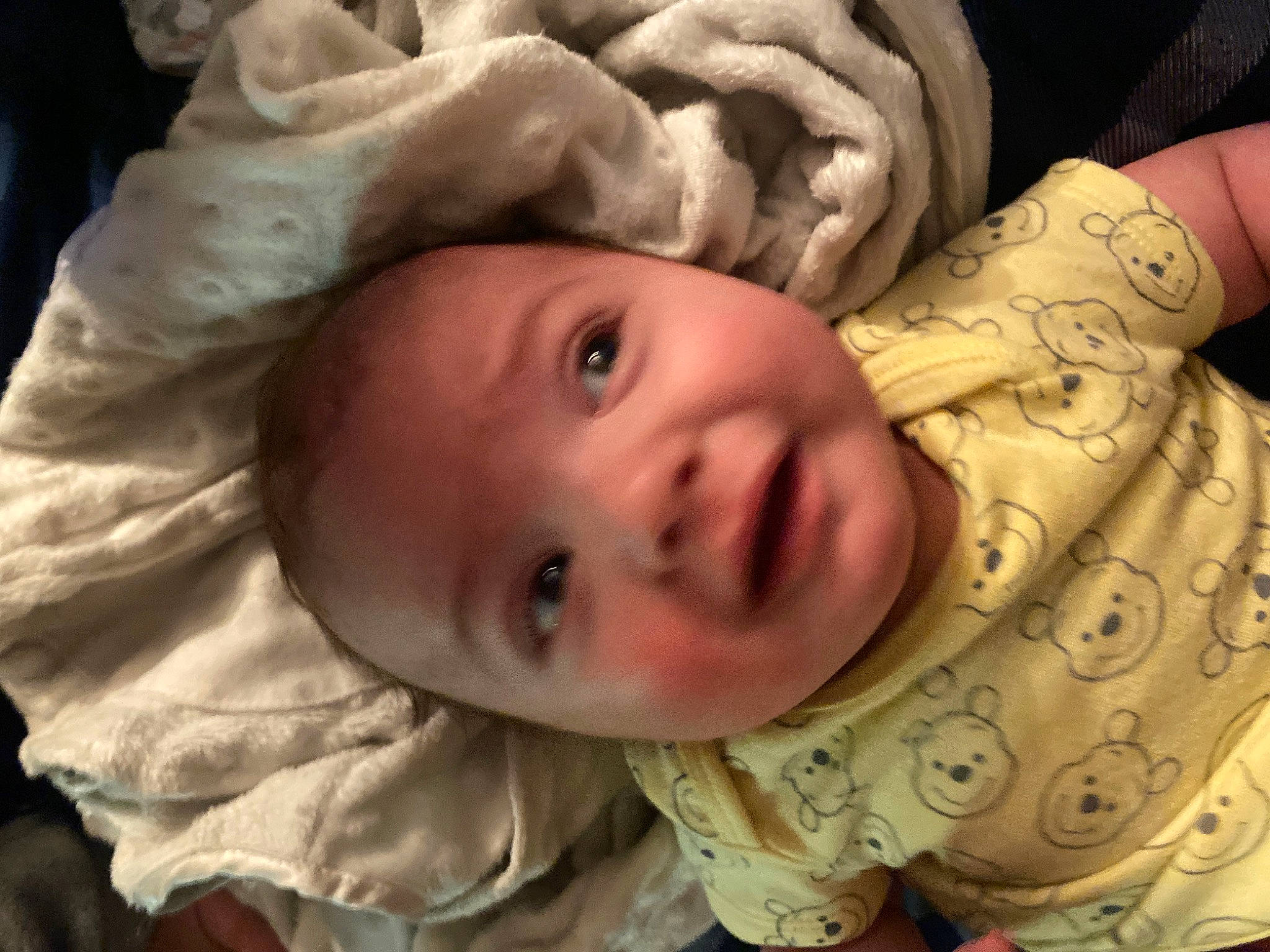 Hayes is registered to the contest to win money with this photo: arm, baby, cheek, chin, ear, eye, eyebrow, eyelash, face, forehead, gesture, hand, head, human_body, iris, lip, mouth, nose, person, skin