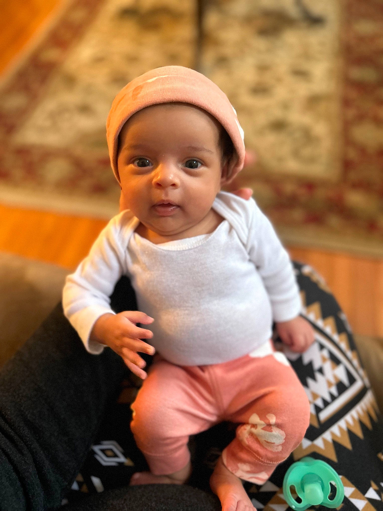 Lailah joined the competition — help win amazing prizes! baby, baby_toddler_clothing, cheek, child, comfort, fun, happy, hat, leisure, person, play, portrait_photography, room, sitting, skin, sleeve, smile, t_shirt, toddler, toy