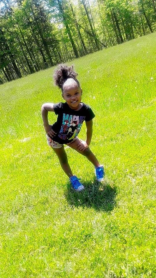 Amayah is registered to the contest to win money with this photo: ball, child, fun, grass, grassland, happy, joy, lawn, meadow, person, plant, play, recreation, youth