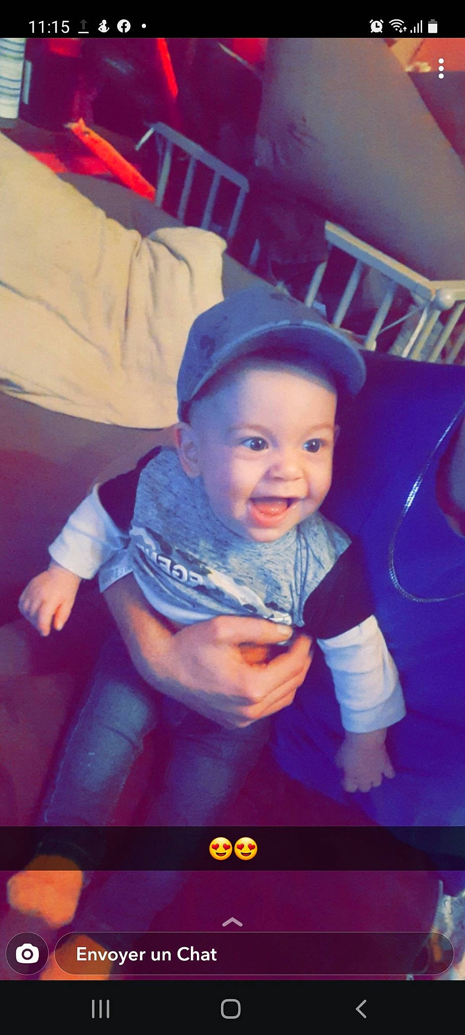Drake participe au concours pour gagner de l'argent avec cette photo : baby, baby_toddler_clothing, baseball_cap, cap, child, cool, electric_blue, electronic_device, face, flash_photography, fun, happy, head, magenta, person, pink, purple, smile, t_shirt, toddler