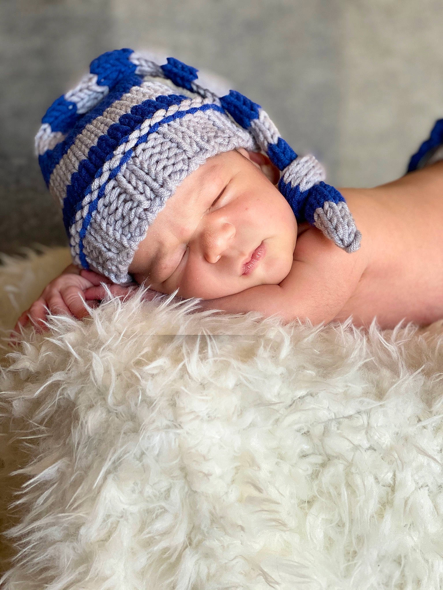 Giovani is registered to the contest to win money with this photo: art, baby, beanie, bonnet, cap, child, clothing, costume_accessory, crochet, fashion_accessory, hat, headgear, headwear, knit_cap, knitting, person, photography, portrait_photography, toddler, wool