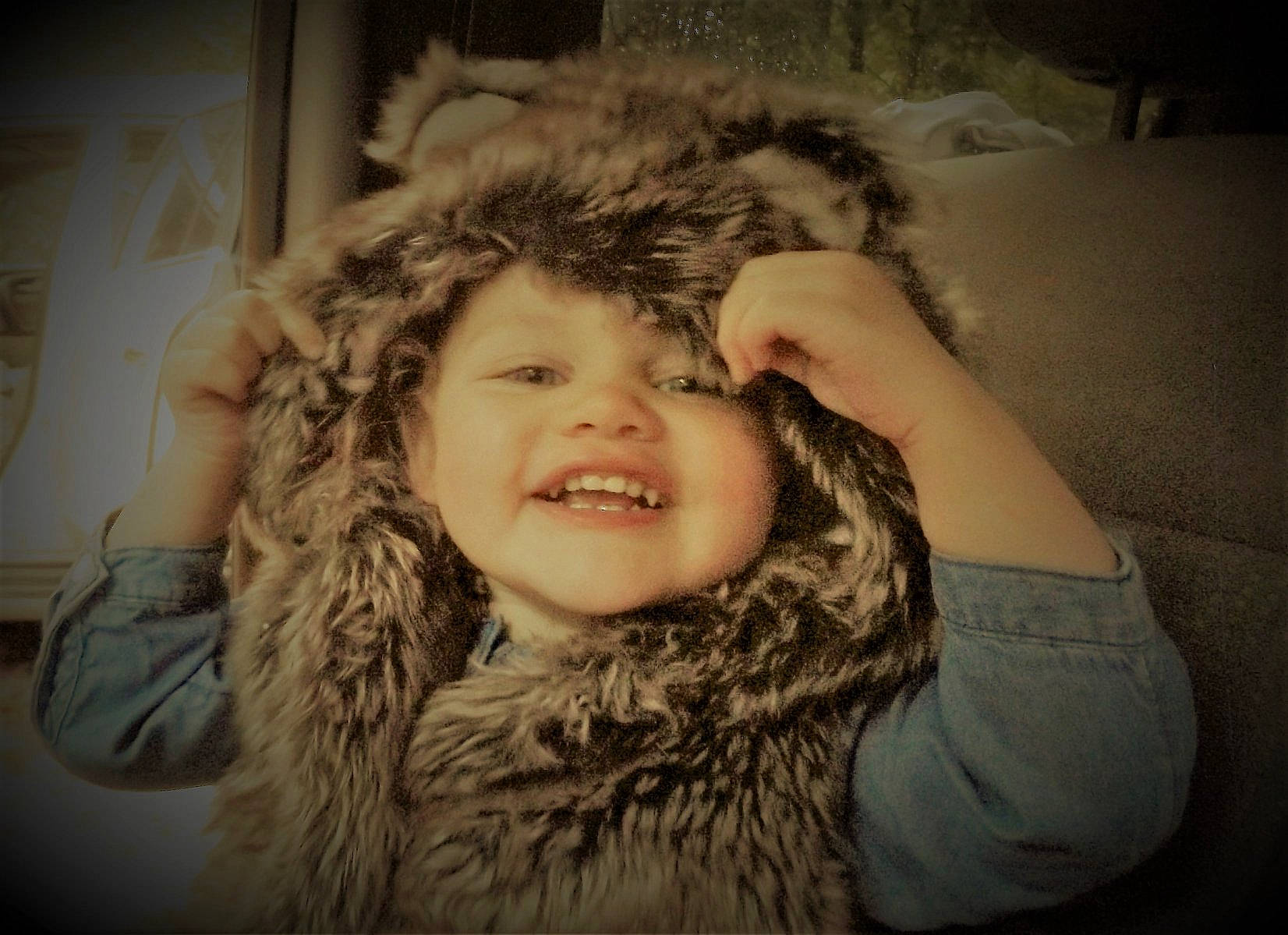 Mckinley is registered to the contest to win money with this photo: beauty, cheek, child, chin, ear, eye, face, facial_expression, forehead, fur, fur_clothing, hair, head, human, lip, nose, organ, person, portrait, skin