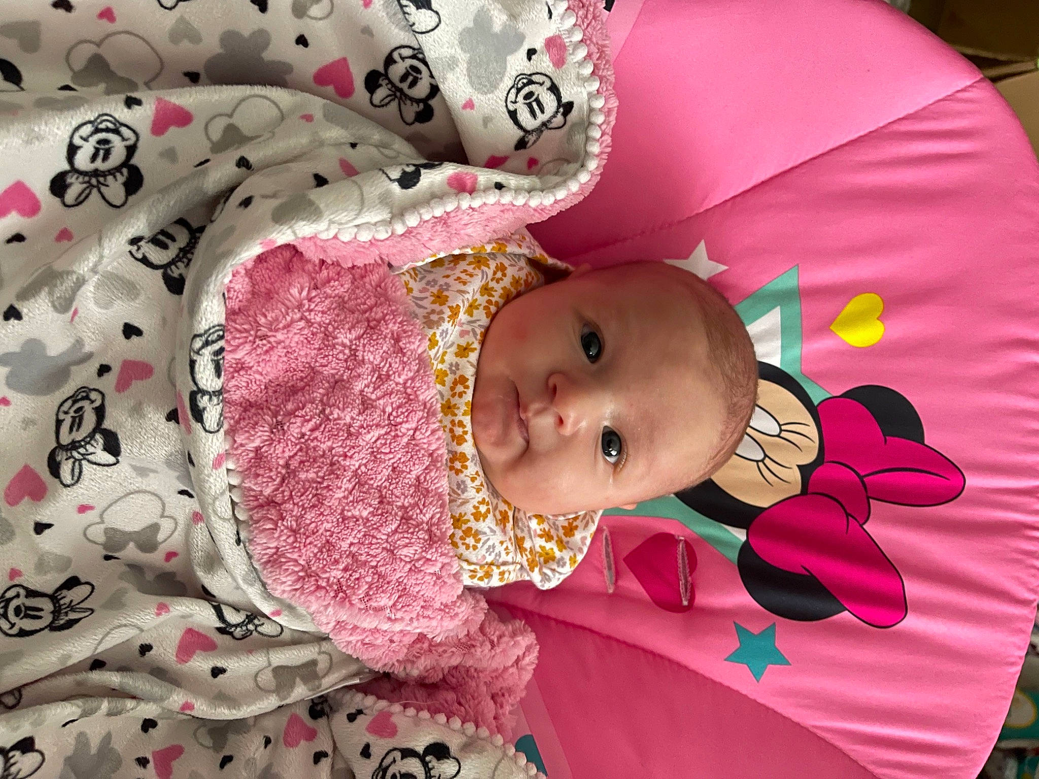 Remmington joined the competition — help win amazing prizes! baby, baby_products, baby_toddler_clothing, cheek, child, clothing, event, eye, face, facial_expression, happy, human_body, linens, magenta, pattern, person, pink, skin, sleeve, textile