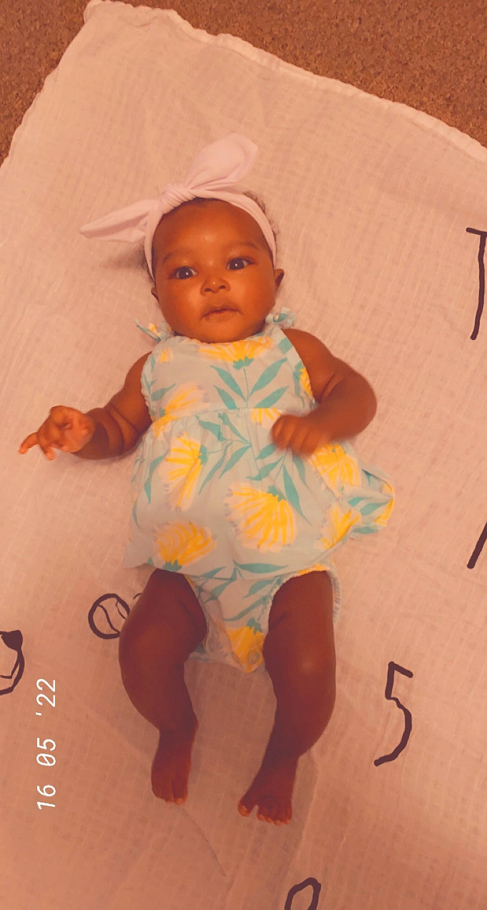 Kennedi is registered to the contest to win money with this photo: baby, baby_toddler_clothing, cap, cheek, child, chin, comfort, facial_expression, finger, fun, happy, linens, mammal, person, room, skin, sleeve, t_shirt, textile, thumb