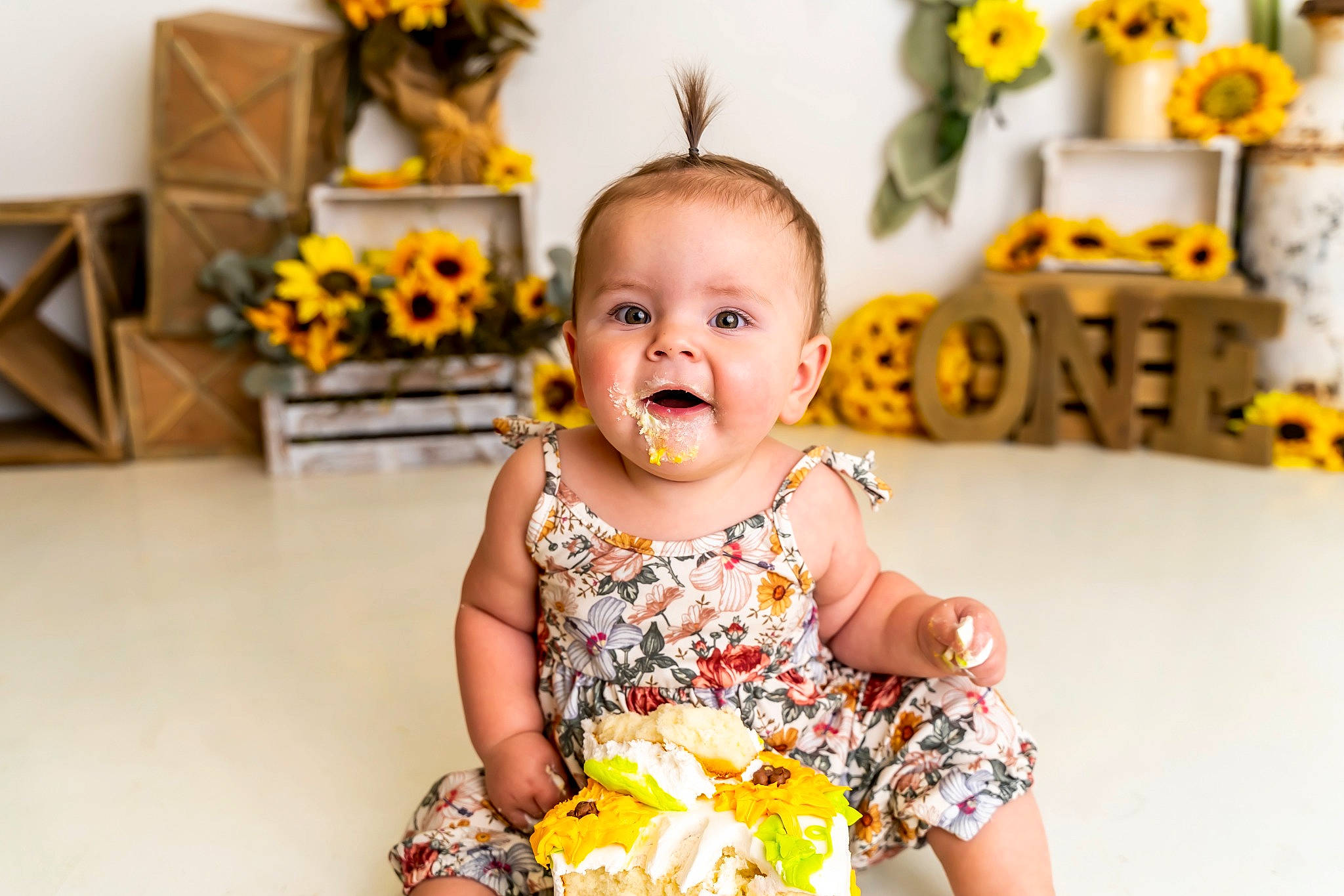 Emberlee is registered to the contest to win money with this photo: baby, baby_toddler_clothing, ceremony, child, dress, event, flower_arranging, fun, happy, orange, party, person, plant, portrait_photography, room, sitting, smile, sweetness, toddler, toy