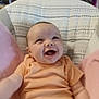 baby, blanket, child, comfortable, cozy, cushion, cute, drooling, face, furniture, happy, home, indoor, infant, onesie, person, portrait, seated, smiling, soft