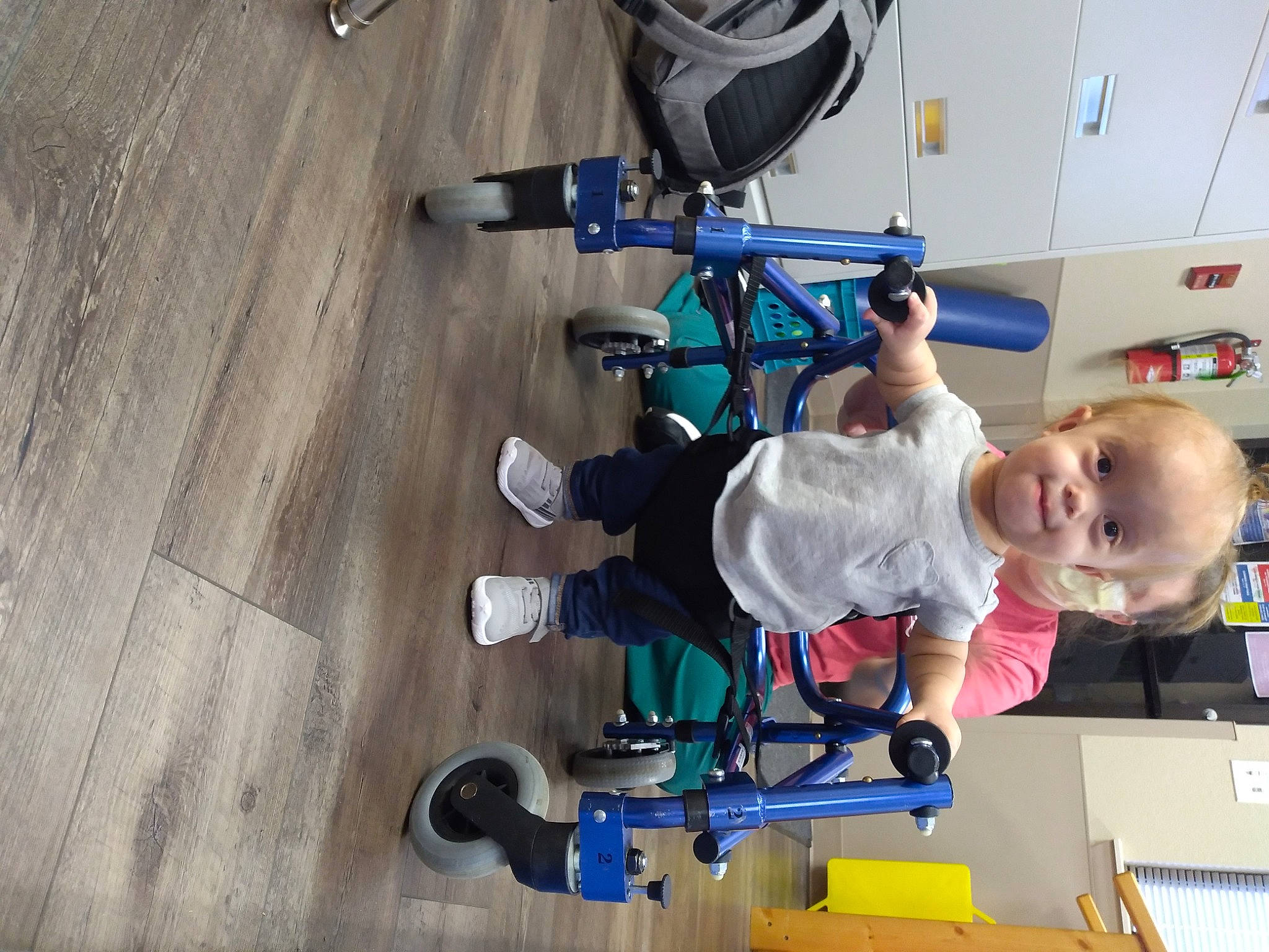 Annalise is registered to the contest to win money with this photo: auto_part, baby, bicycle_wheel, bicycles_equipment_and_supplies, child, electric_blue, engineering, fun, machine, person, physical_fitness, recreation, smile, sports, sports_equipment, t_shirt, tire, toddler, vehicle, wheel