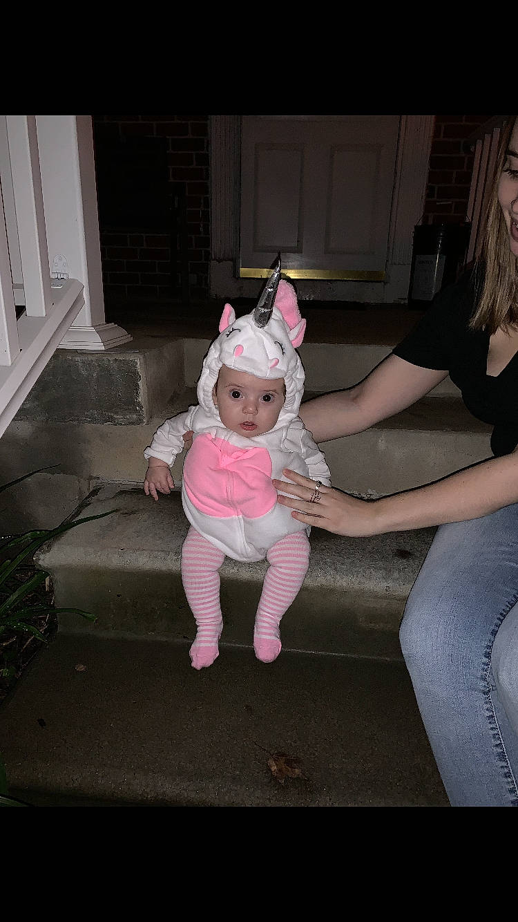 Isabella is registered to the contest to win money with this photo: child, costume, headwear, person, pink, toddler