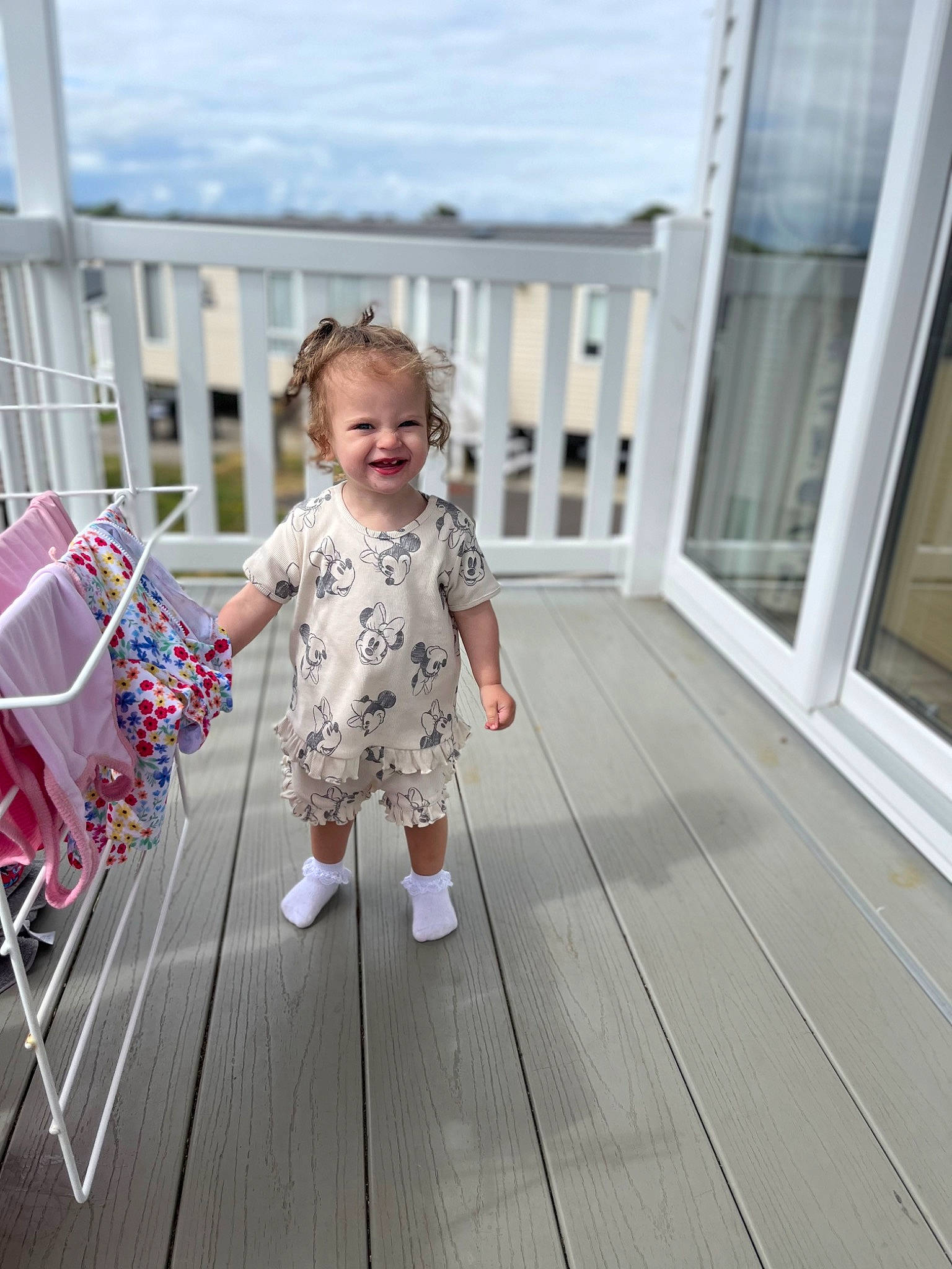 Maddison joined the competition — help win amazing prizes! baby, baby_toddler_clothing, chair, child, deck, flooring, happy, hardwood, home, joy, laminate_flooring, leisure, pattern, person, sitting, sky, smile, standing, toddler, wood