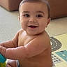 baby, child, smile, happy, sitting, indoor, play_mat, toy, cute, chubby, face, infant, skin, person, young_child, expression, cheeks, eyes, arms, legs