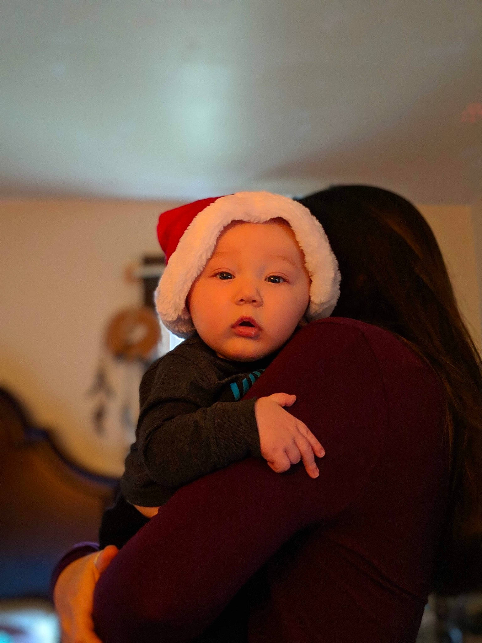 Ej Scruggs  is registered to the contest to win money with this photo: baby, cheek, child, christmas, fun, head, headgear, person, sitting, skin, smile, toddler, vacation
