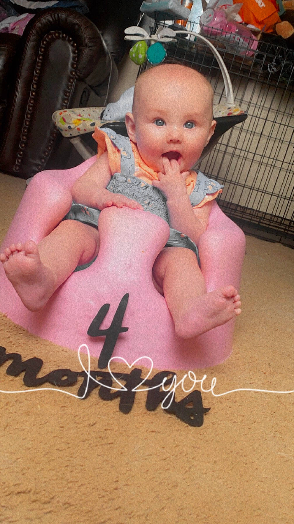 Aurora is registered to the contest to win money with this photo: abdomen, baby, baby_products, baby_toddler_clothing, cheek, chest, curtain, event, eye, finger, fun, happy, head, lap, person, pink, sitting, surprise, thigh, toddler