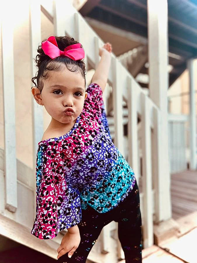 Breeley joined the competition — help win amazing prizes! baby_toddler_clothing, child, cool, day_dress, dress, fashion_design, hair, happy, head, magenta, neck, outerwear, pattern, person, pink, shoulder, sleeve, standing, t_shirt, toddler
