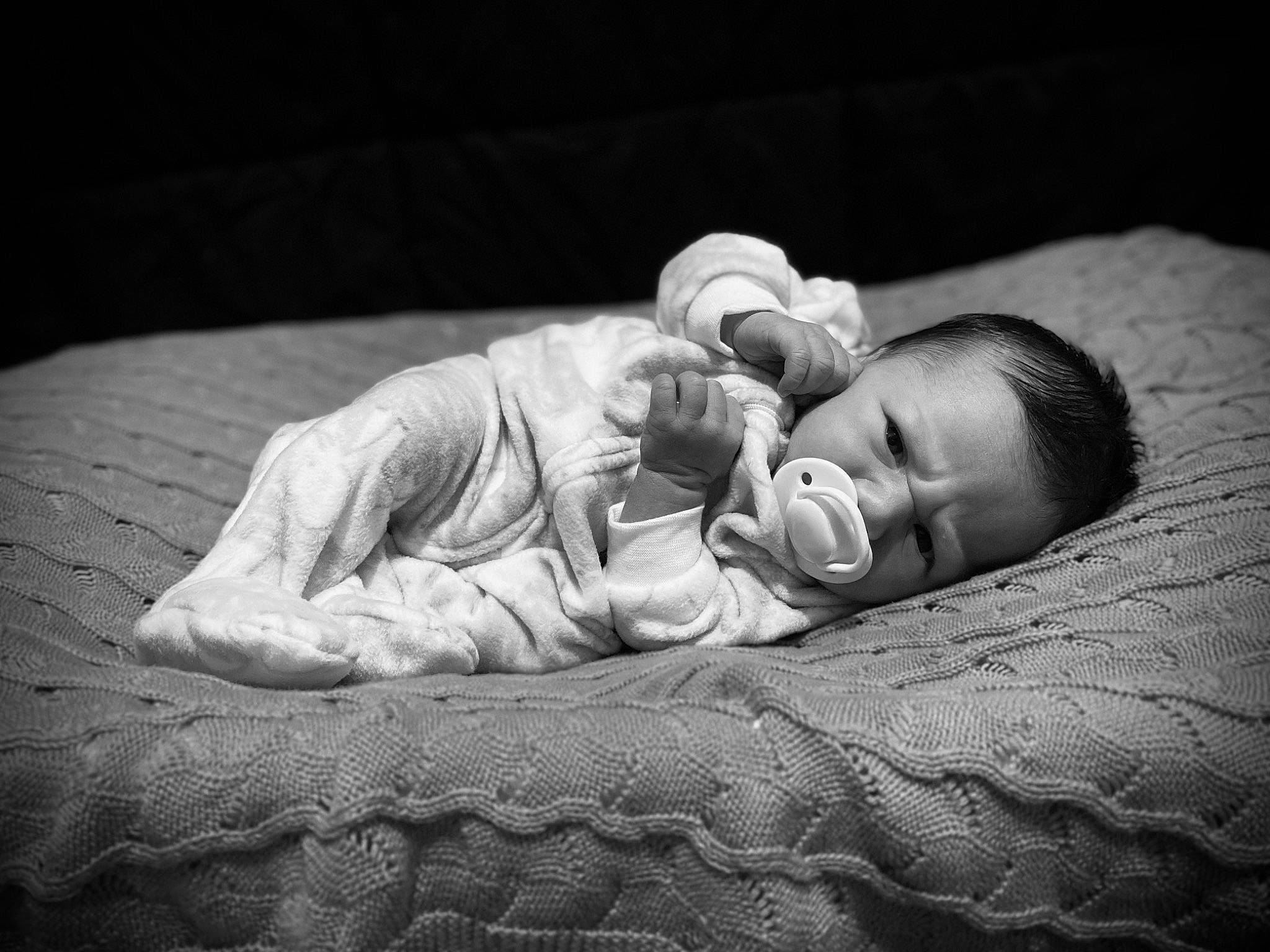 Braxley joined the competition — help win amazing prizes! baby, baby_toddler_clothing, child, comfort, darkness, eye, flash_photography, flooring, grass, head, linens, monochrome, monochrome_photography, person, portrait_photography, room, sitting, skin, still_life_photography, toddler