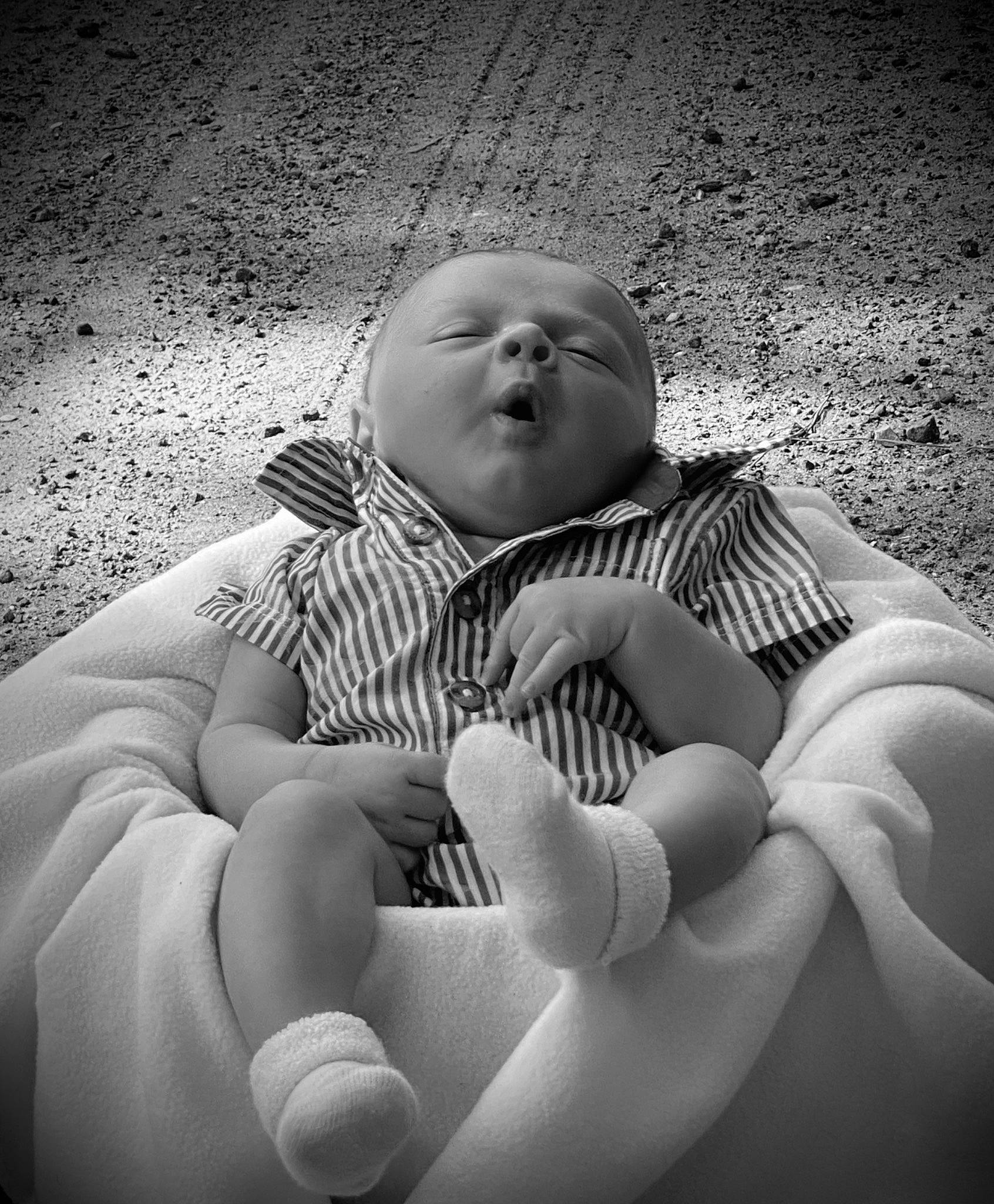 Canyon is registered to the contest to win money with this photo: baby, black, black_and_white, child, eye, finger, hand, monochrome, monochrome_photography, person, photograph, photography, skin, smile, stock_photography, style, toddler, white
