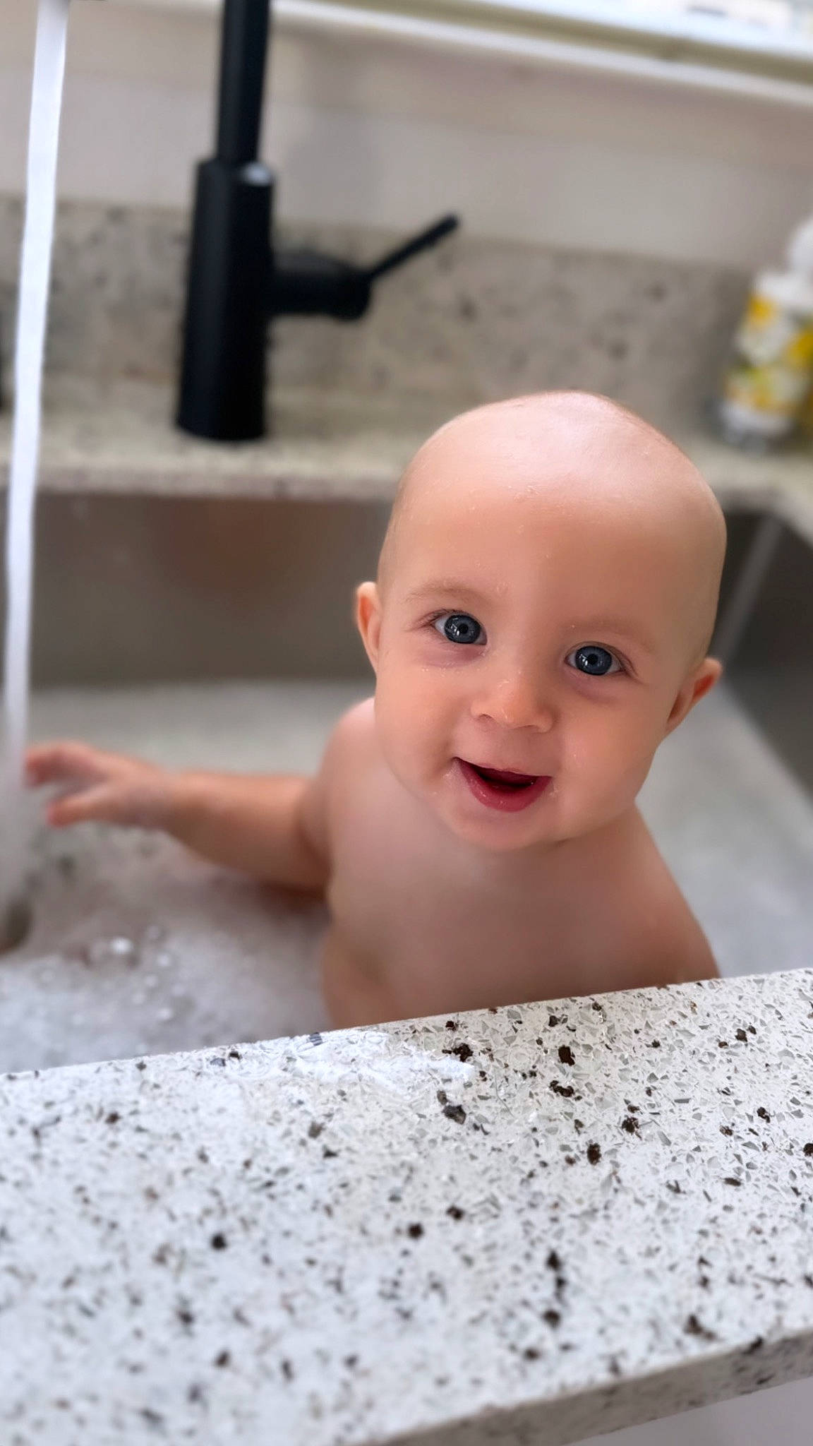 Jett joined the competition — help win amazing prizes! baby, bathing, cheek, chest, child, chin, concrete, eyebrow, eyelash, flash_photography, floor, flooring, fun, happy, hardwood, person, plumbing, room, smile, toddler