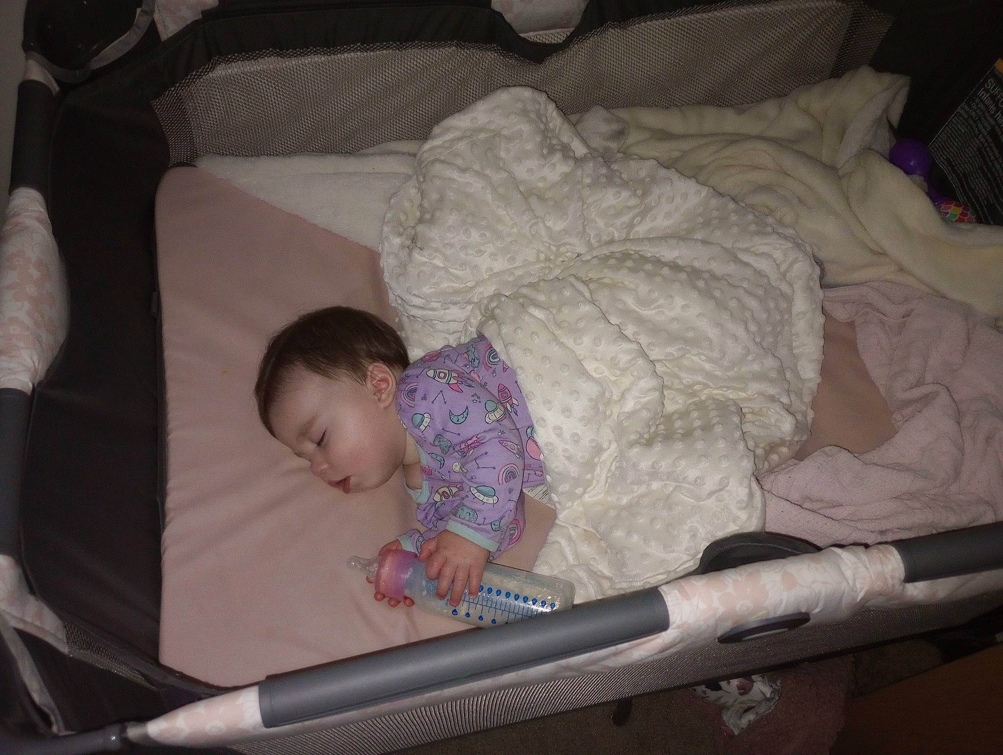 Nova is registered to the contest to win money with this photo: baby, baby_products, baby_safety, baby_toddler_clothing, bed, bedtime, child, comfort, facial_expression, finger, flash_photography, head, human_body, infant_bed, linens, nap, person, room, sitting, sleep