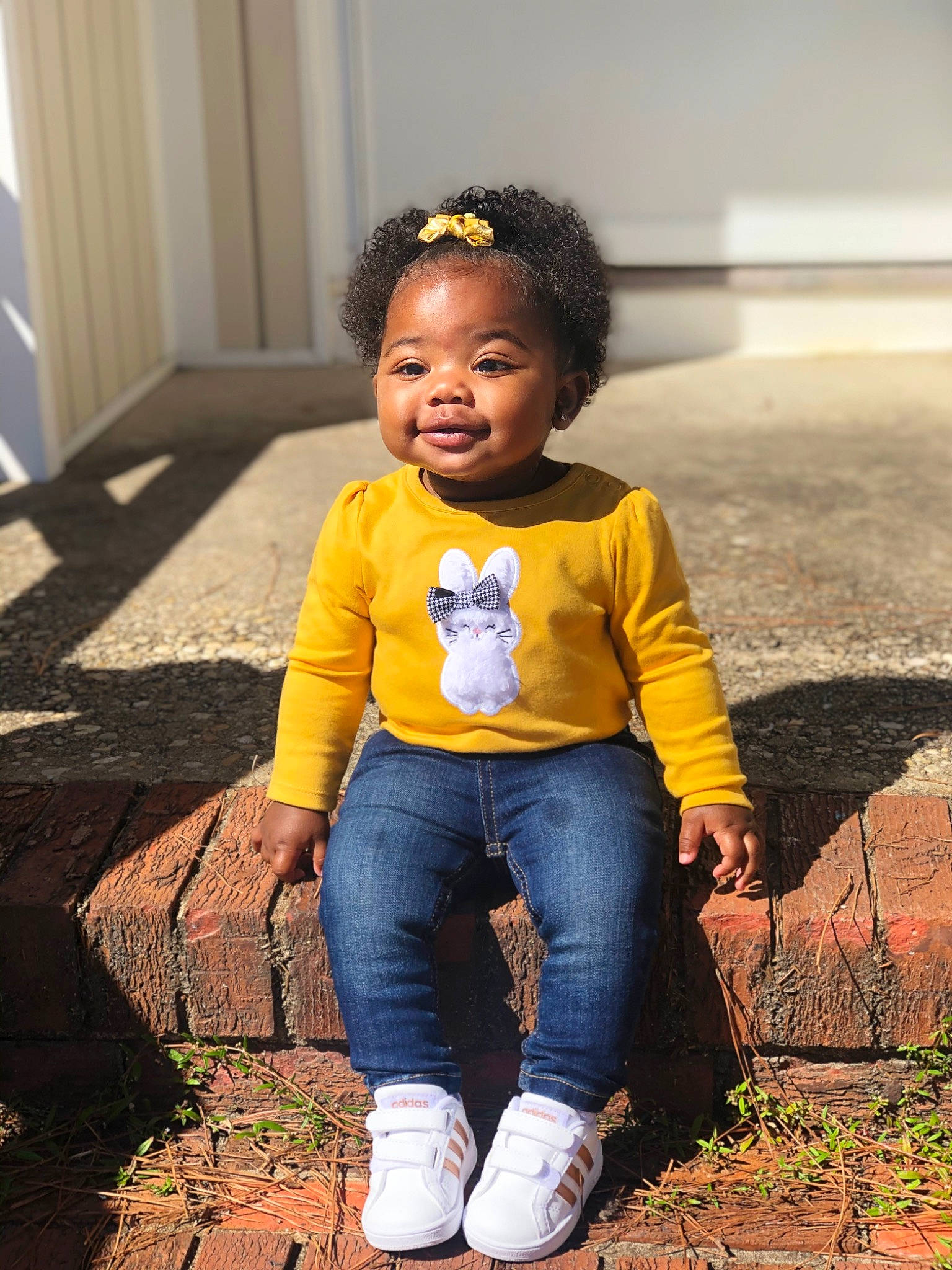 Melanie is registered to the contest to win money with this photo: baby_toddler_clothing, beauty, cool, face, flash_photography, fun, grass, hairstyle, happy, human, jeans, orange, people_in_nature, person, sleeve, smile, standing, t_shirt, tints_and_shades, toddler