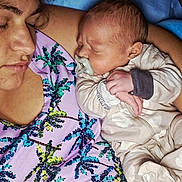 John joined the competition — help win amazing prizes! baby, adult, sleeping, pacifier, arm, blanket, clothing, face, hand, person, portrait, rest, snuggle, together, young_child, infant, peaceful, cozy, bedroom, closeup