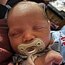 John joined the competition — help win amazing prizes! baby, pacifier, sleeping, infant, closeup, hand, clothing, blanket, soft, peaceful, face, newborn, cute, resting, indoors, portrait, child, skin, young, expressionless