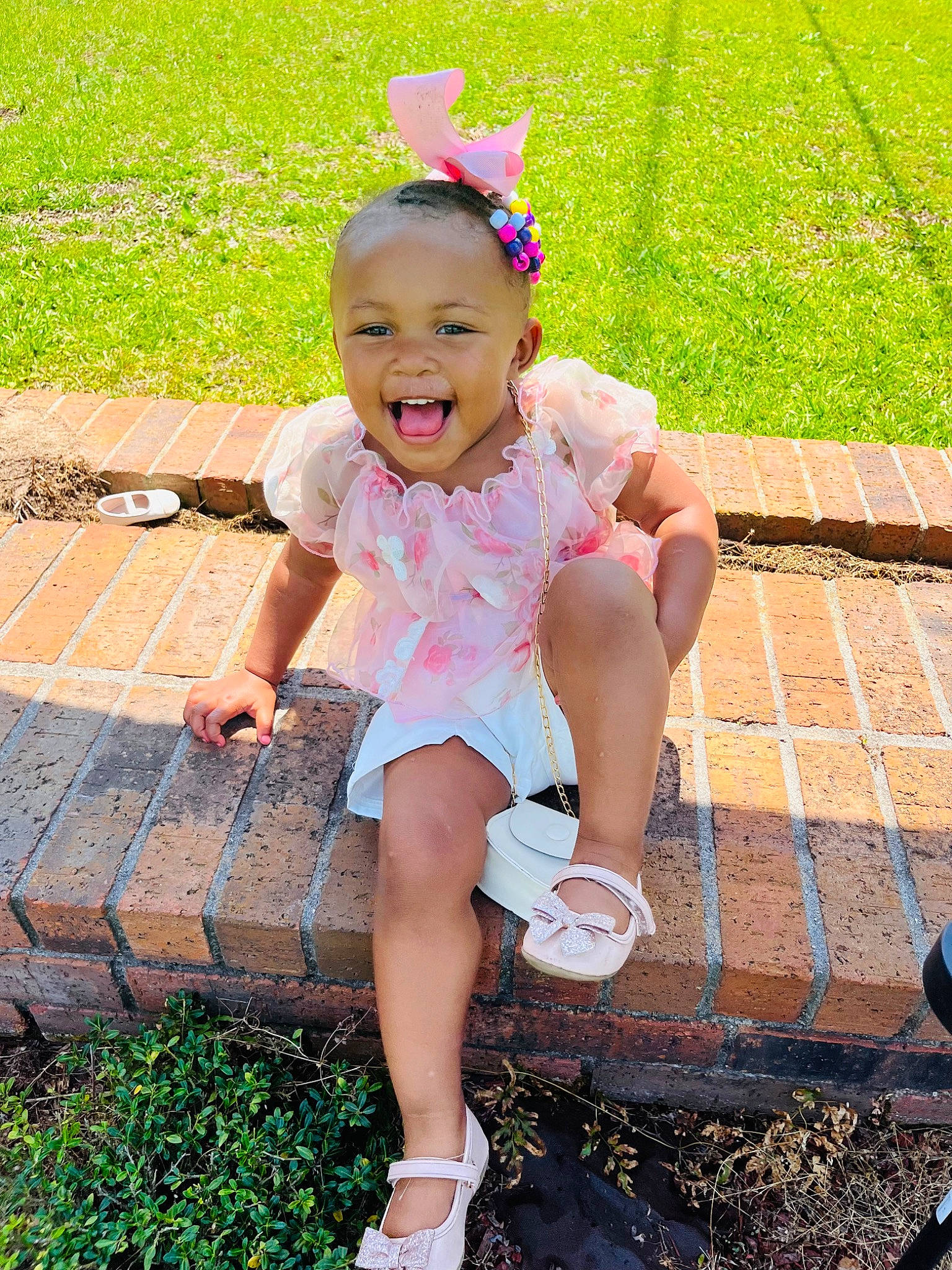 Kaisley Marie joined the competition — help win amazing prizes! baby_toddler_clothing, child, eye, face, fun, grass, green, happy, human_leg, leaf, leisure, magenta, people_in_nature, person, pink, public_space, skin, smile, summer, thigh