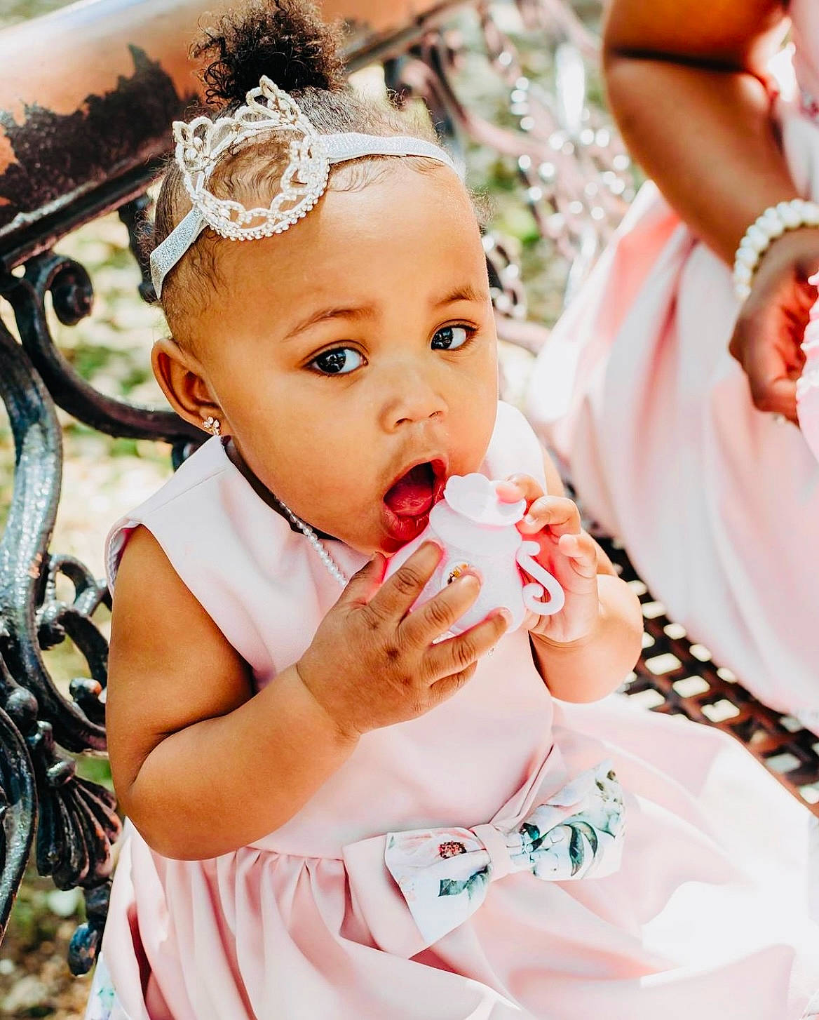 Kaisley Marie joined the competition — help win amazing prizes! arm, baby, baby_toddler_clothing, child, eyelash, facial_expression, food_craving, fruit, gesture, hairstyle, hand, happy, headband, headpiece, jewellery, nail, person, pink, skin, surprise